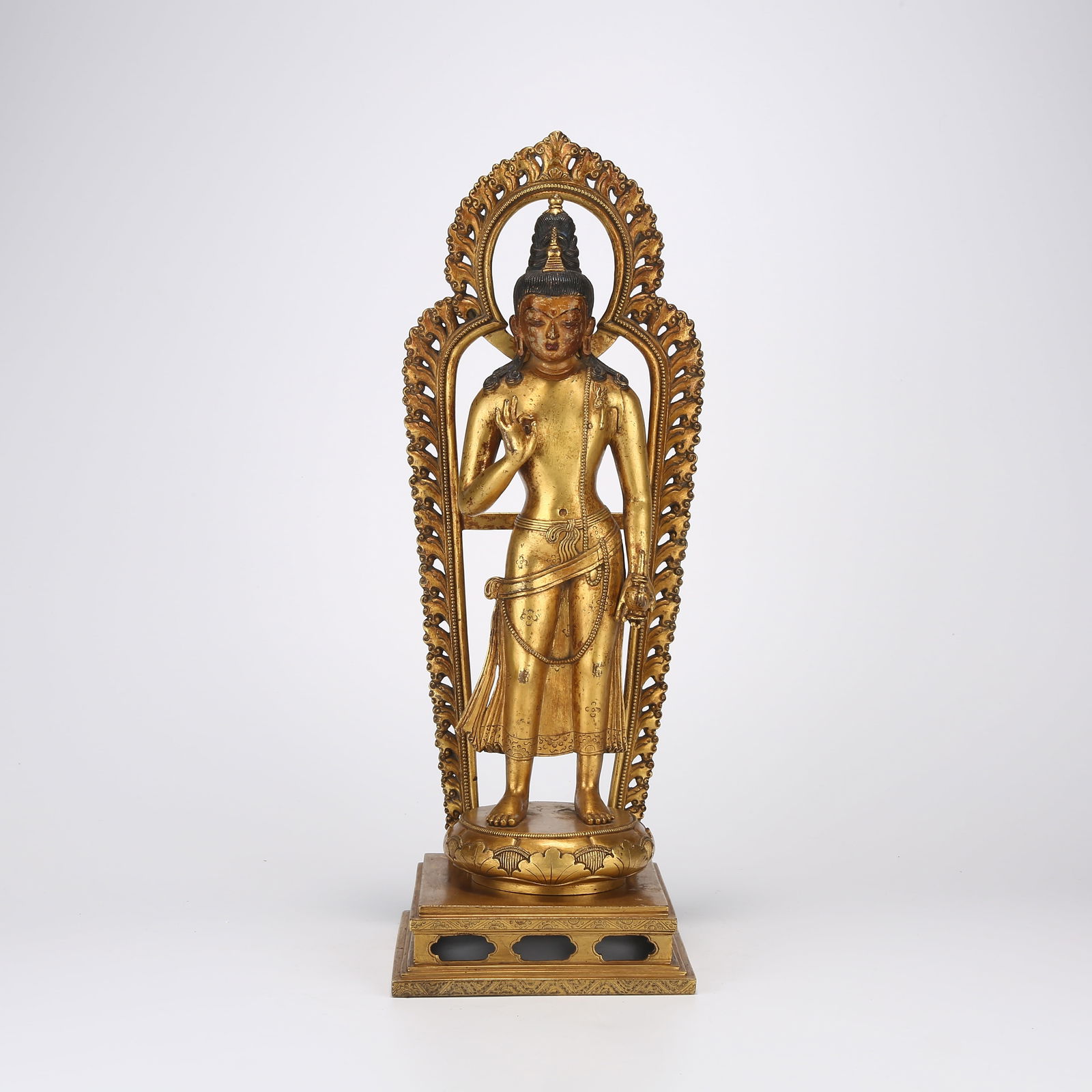 A GILDED BRONZE STANDING STATUE OF MAITREYA BODHISATTVA: Gilded bronze standing statue of Maitreya Bodhisattva