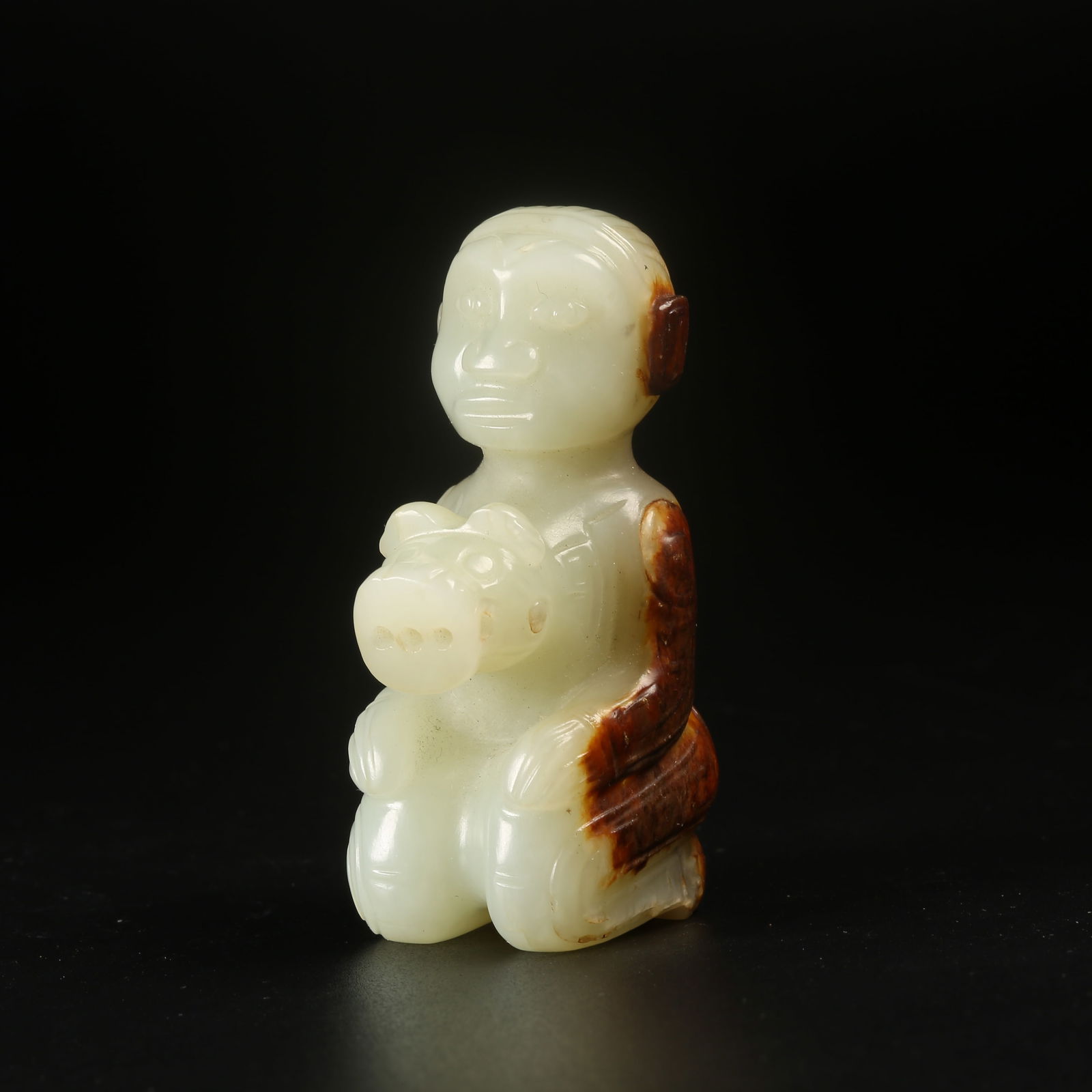 A ARCHAIC JADE KNEELING FIGURE: Archaic Jade Kneeling Figure