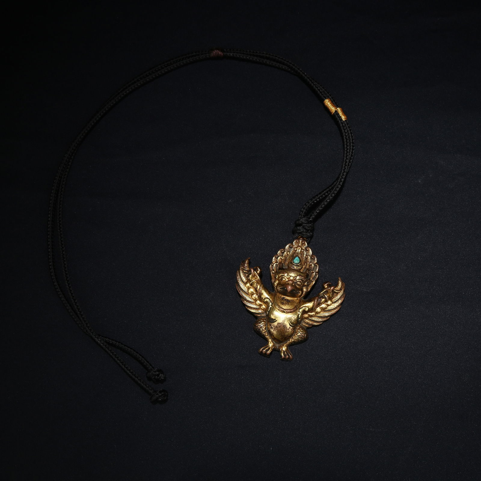 A GILT BRONZE GARUDA BIRD PENDANT: Gilt Bronze Garuda Bird Pendant