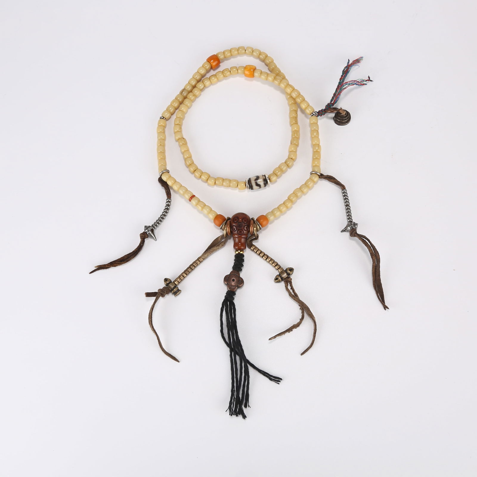 A STRAND OF BONE PRAYER BEADS: One strand of bone prayer beads