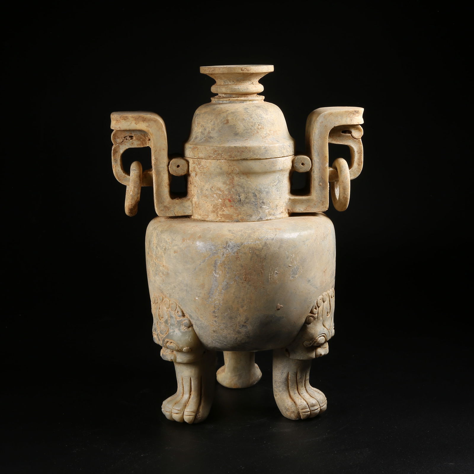 A ARCHAIC JADE TRIPOD LIDDED CENSER WITH MOVABLE RING: Archaic jade tripod lidded censer with movable ring