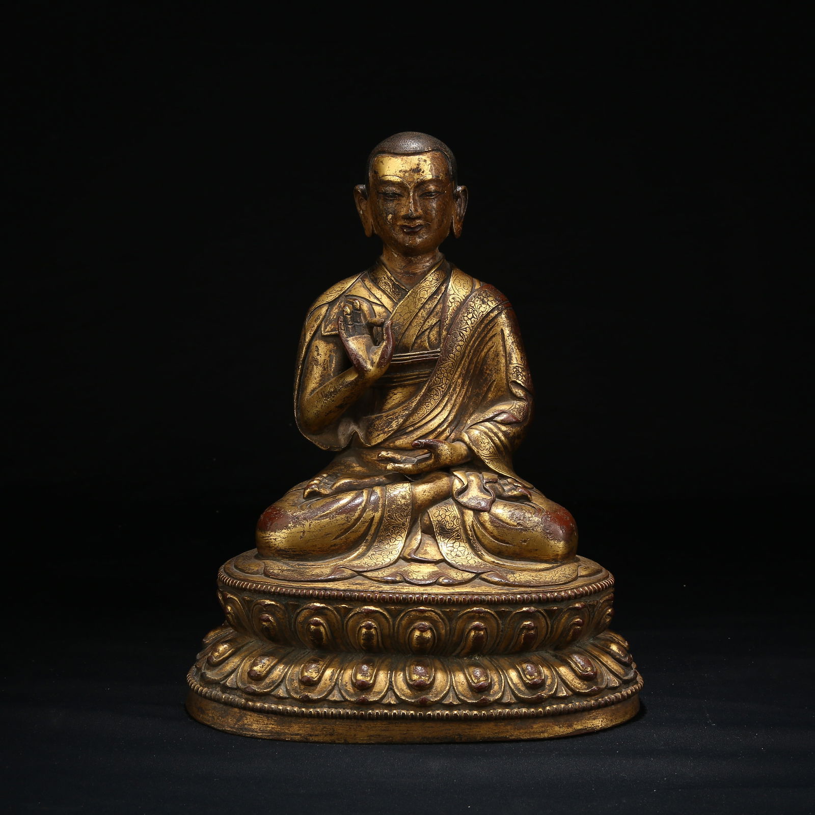 A GILT BRONZE LAMA STATUE: Gilt Bronze Lama Statue