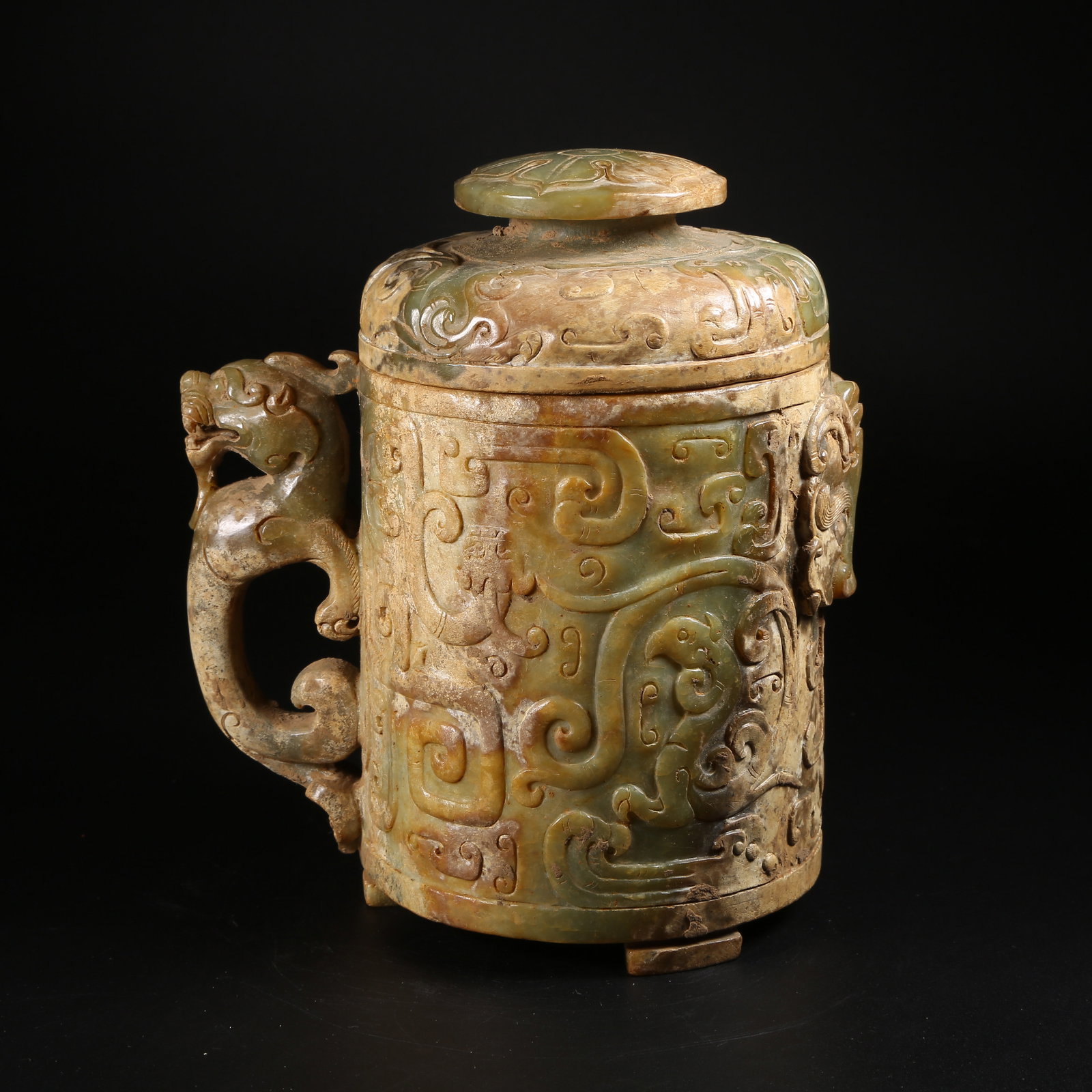 A ARCHAIC JADE LIDDED CENSER WITH BEAST-SHAPED HANDLES: Archaic jade lidded censer with beast-shaped handles