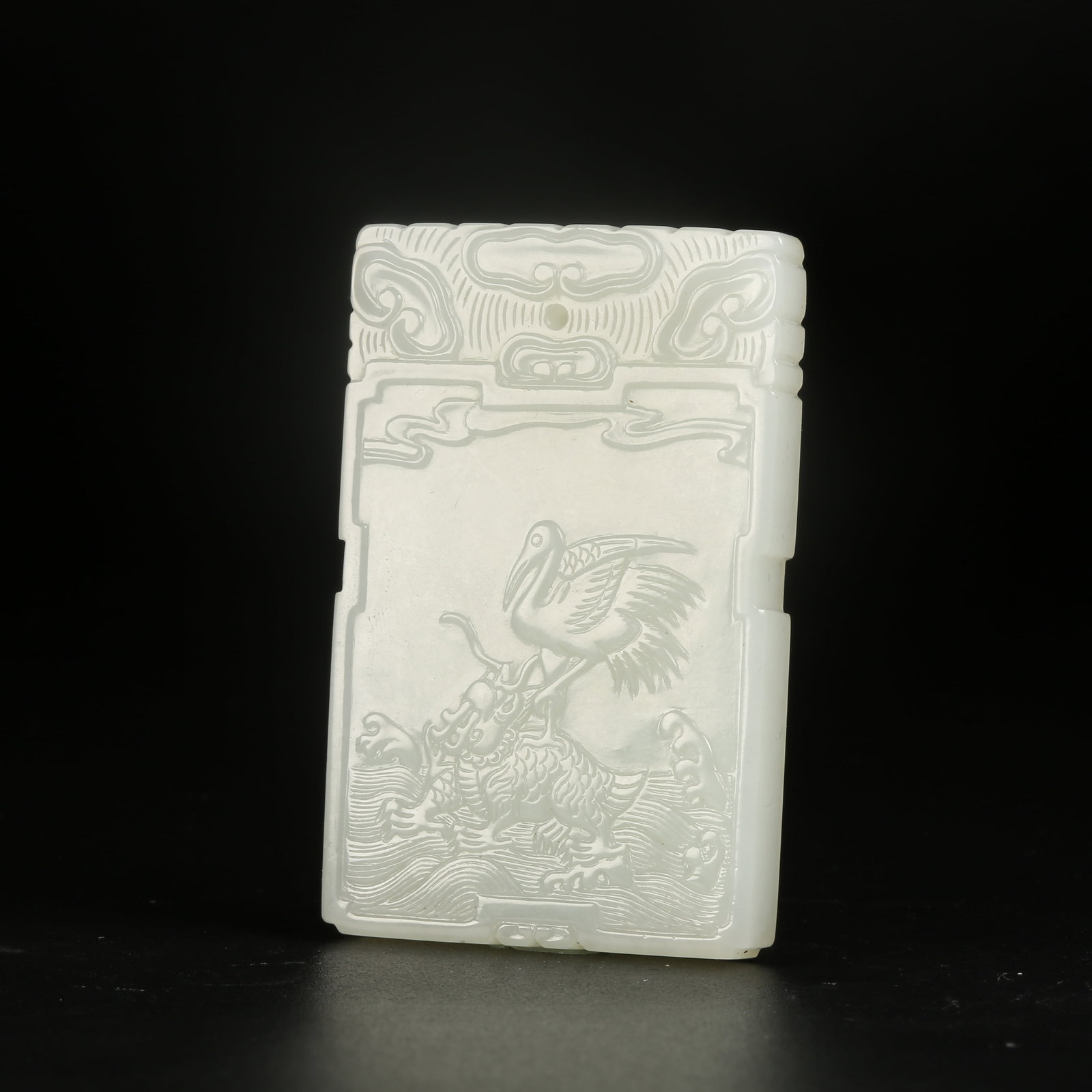 A HETIAN JADE AUSPICIOUS BEAST PATTERN PLAQUE (1 of 8)