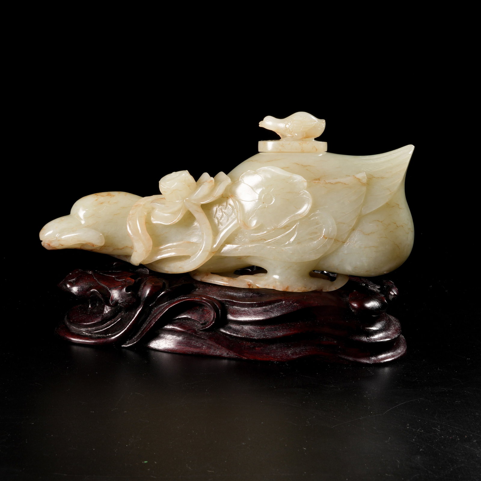 A HETIAN YELLOW JADE WATER VESSEL WITH "MANDARIN DUCK HOLDING LOTUS" MOTIF (1 of 9)