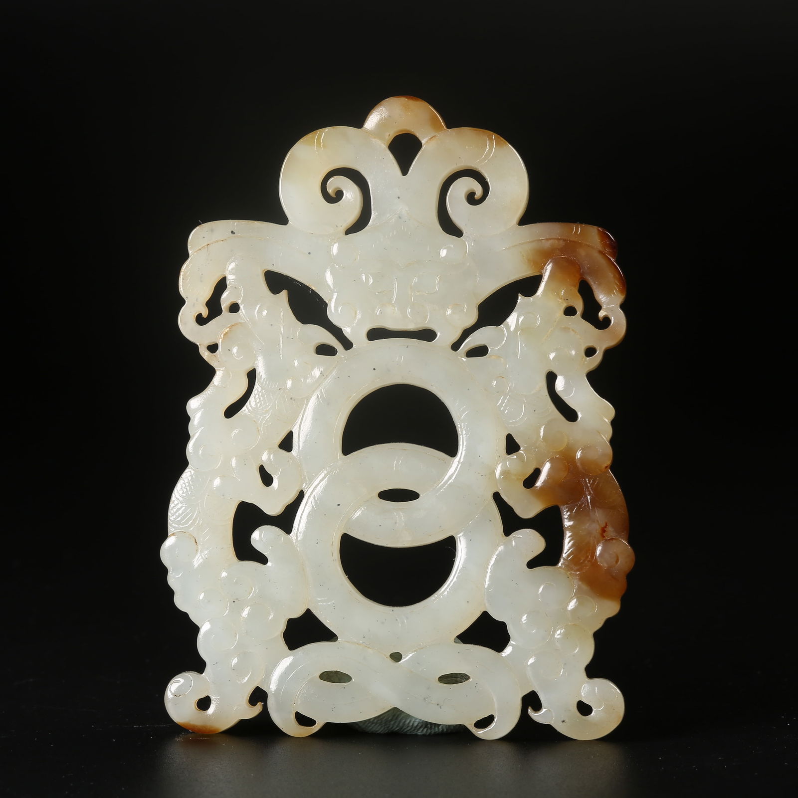 A ARCHAIC JADE DRAGON-MOTIF PENDANT (1 of 8)
