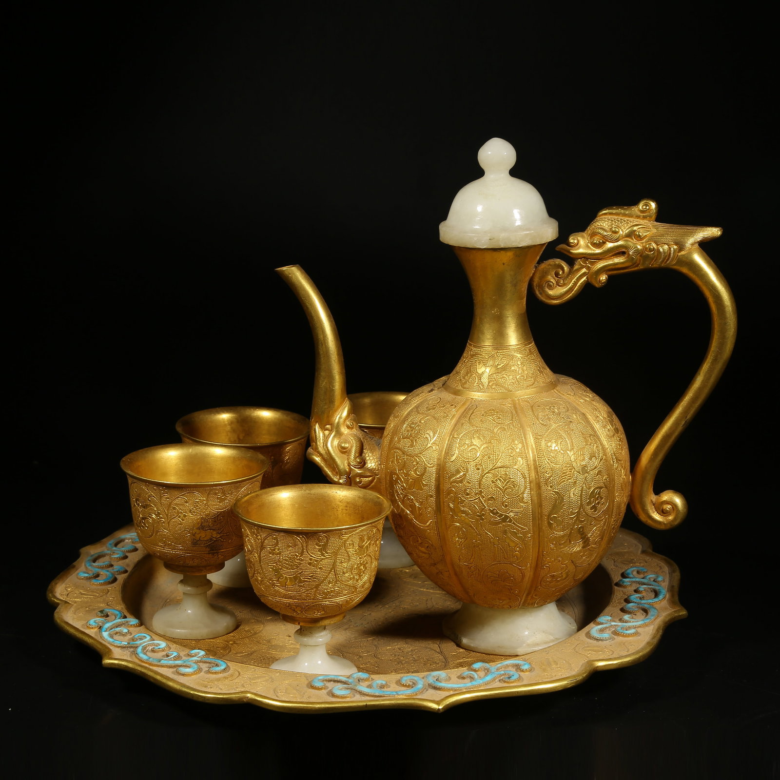 A GILT BRONZE WINE SET INLAID WITH HETIAN JADE: Gilt Bronze Wine Set Inlaid with Hetian Jade