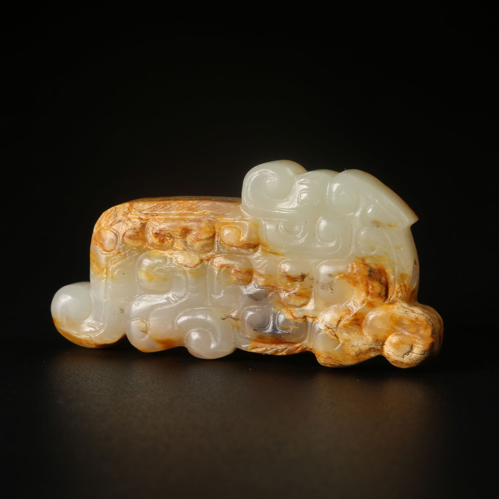 A ARCHAIC JADE TIGER-FORM PENDANT (1 of 8)