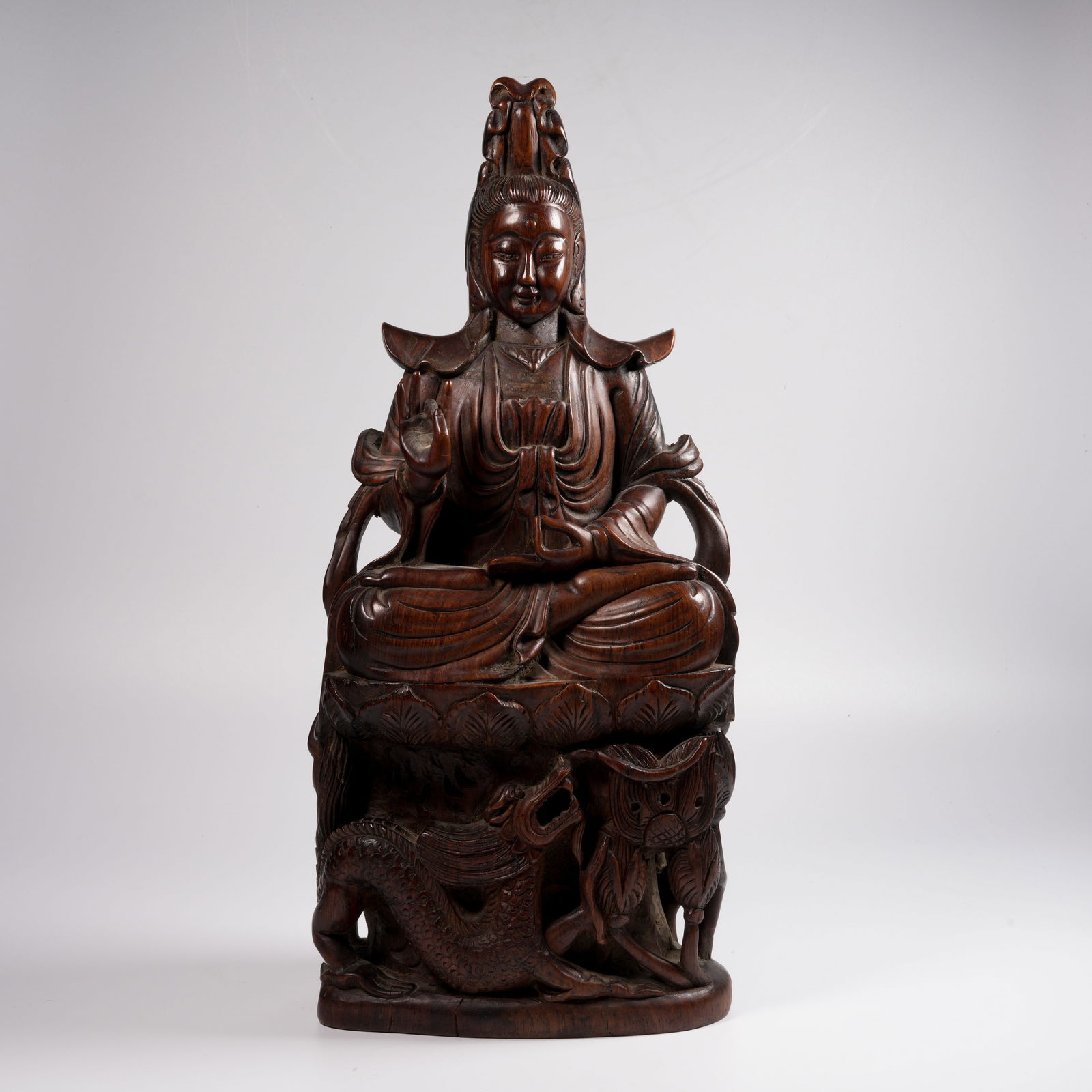 A HUANGHUALI WOOD GUANYIN FIGURE (1 of 9)