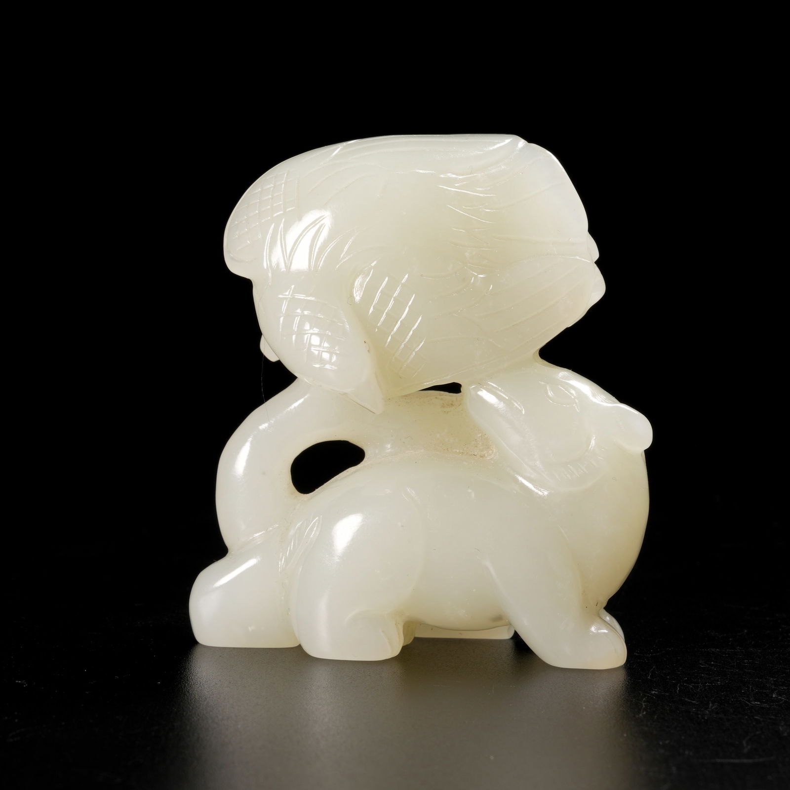 A HETIAN JADE "EAGLE AND BEAR IN BATTLE OF WITS" ORNAMENT (1 of 8)