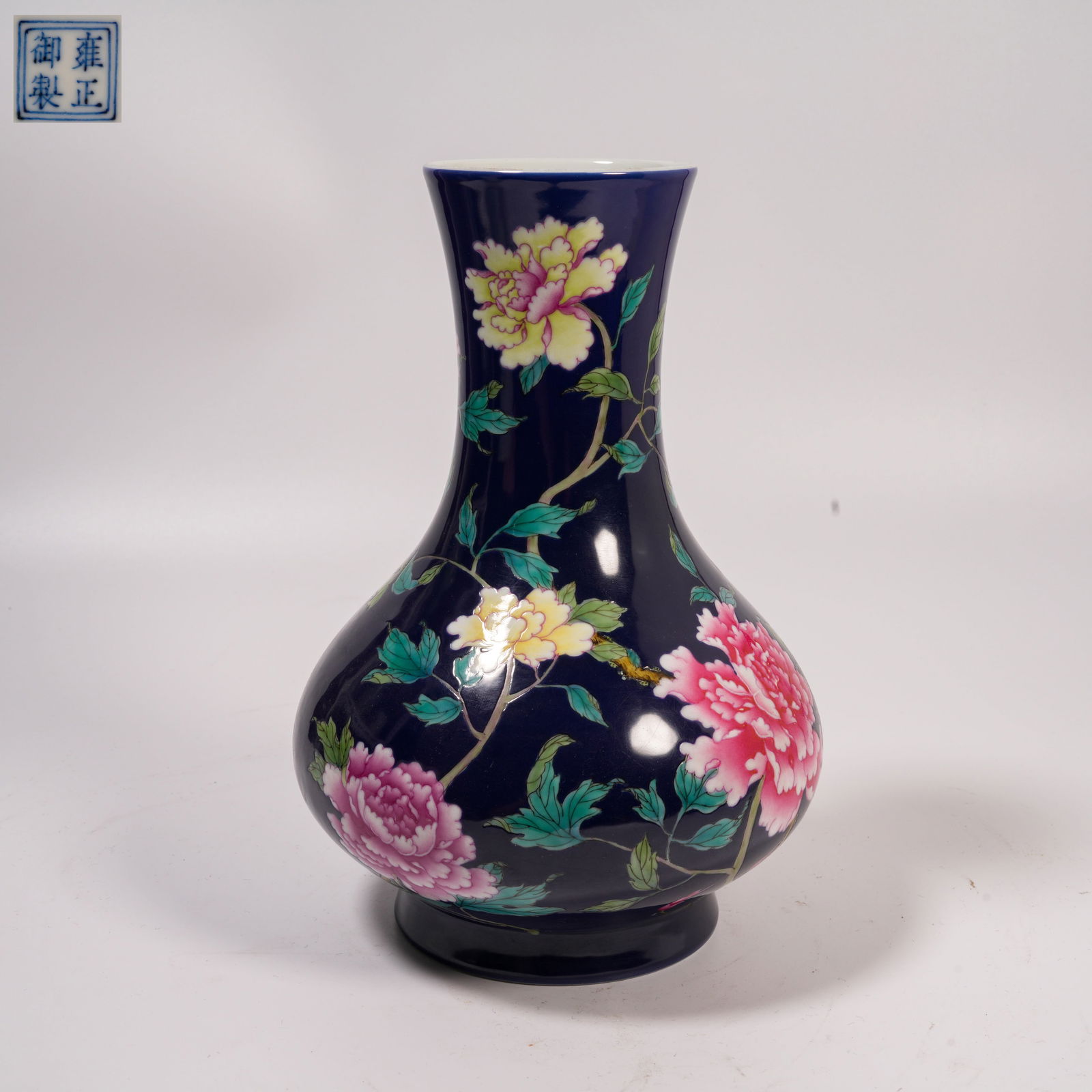 A FAMILLE-ROSE WATER-CHESTNUT–SHAPED VASE WITH FLOWER DESIGN: Famille-Rose Water-Chestnut–Shaped Vase with Flower Design
