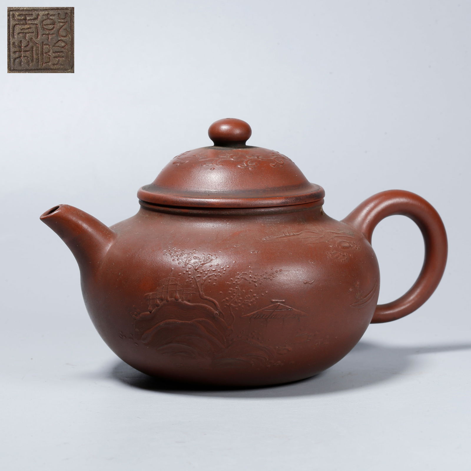 A ZISHA EWER WITH CARVED LANDSCAPE DESIGN: Zisha Ewer with Carved Landscape Design