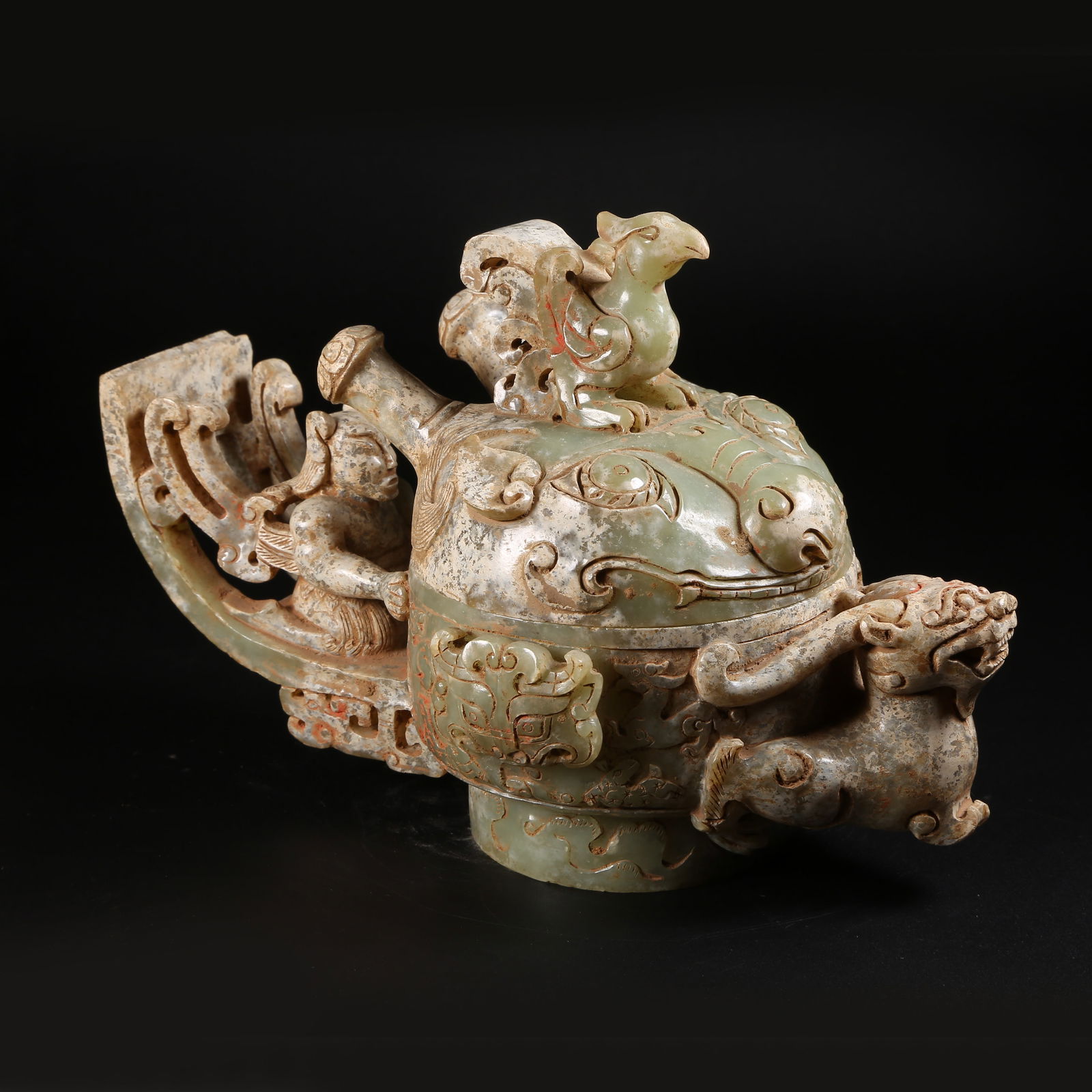 A ARCHAIC JADE LIDDED CENSER WITH BEAST-FACE MOTIFS: Archaic jade lidded censer with beast-face motifs