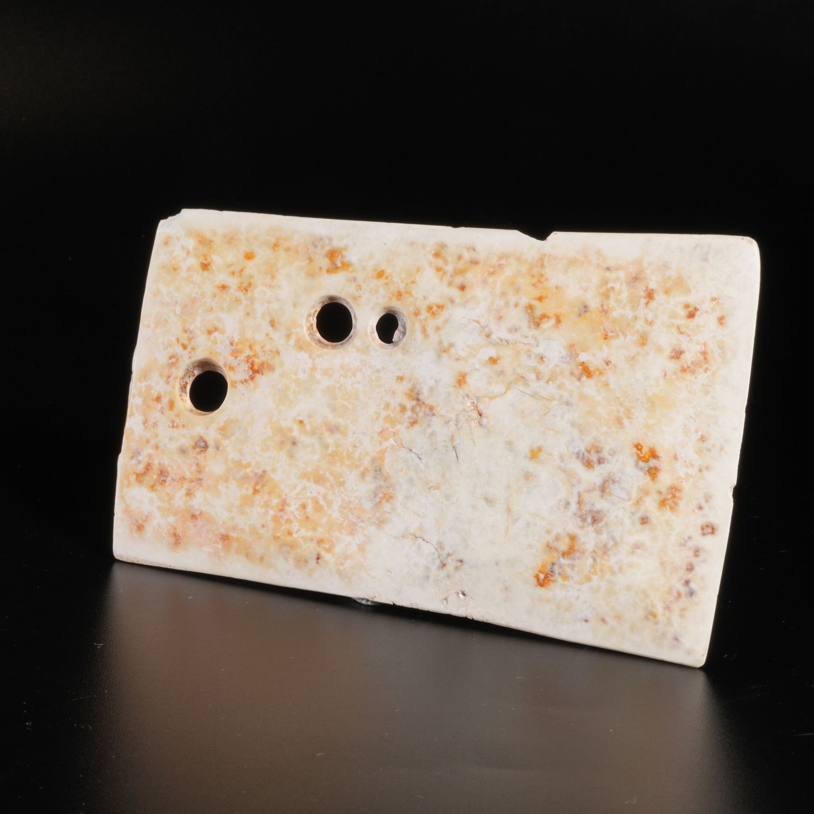 A ARCHAIC JADE CARVED RITUAL BLADE: Archaic jade carved ritual blade