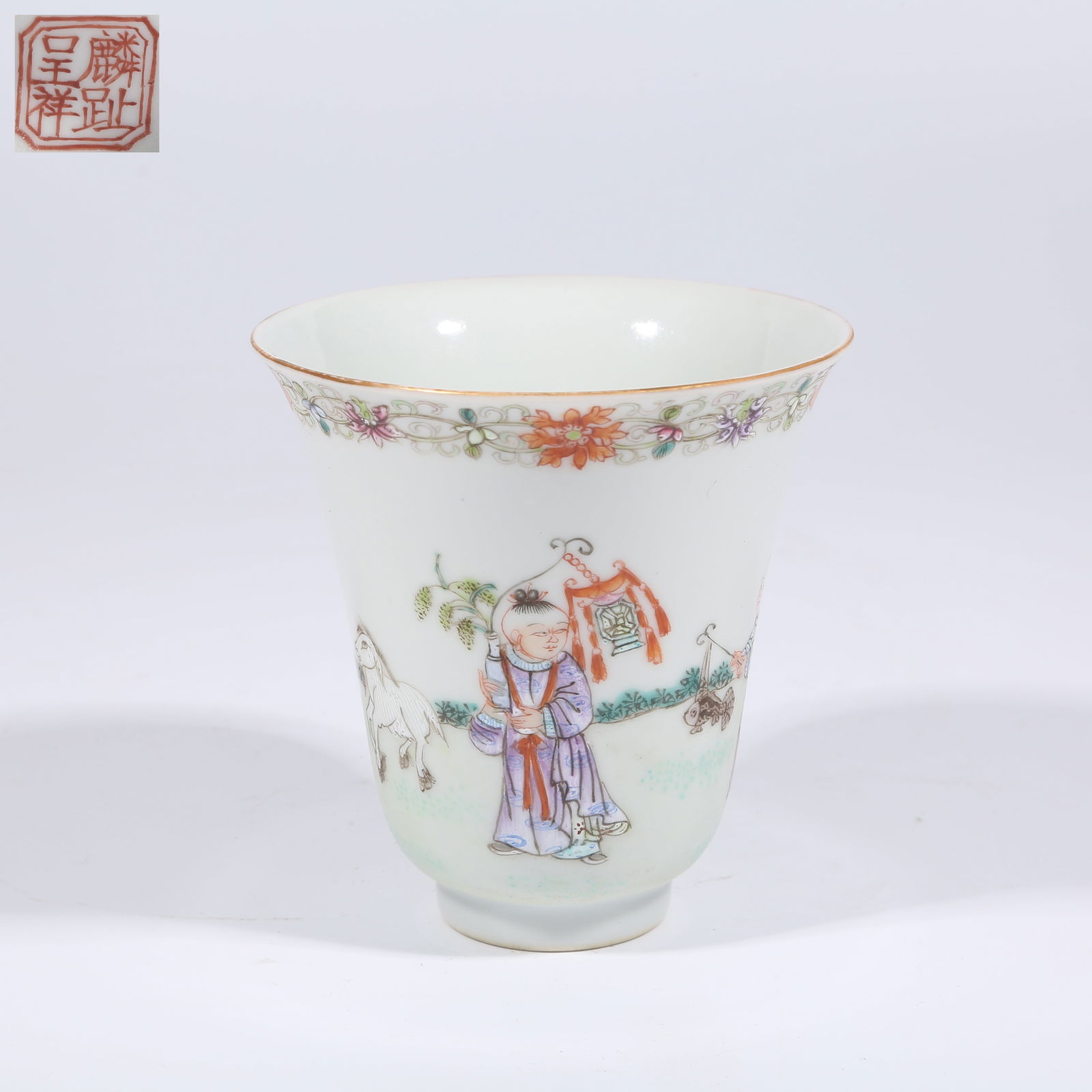 A FAMILLE ROSE LINGDANG CUP WITH BOYS AT PLAY DESIGN: Famille Rose Lingdang Cup with Boys at Play Design
