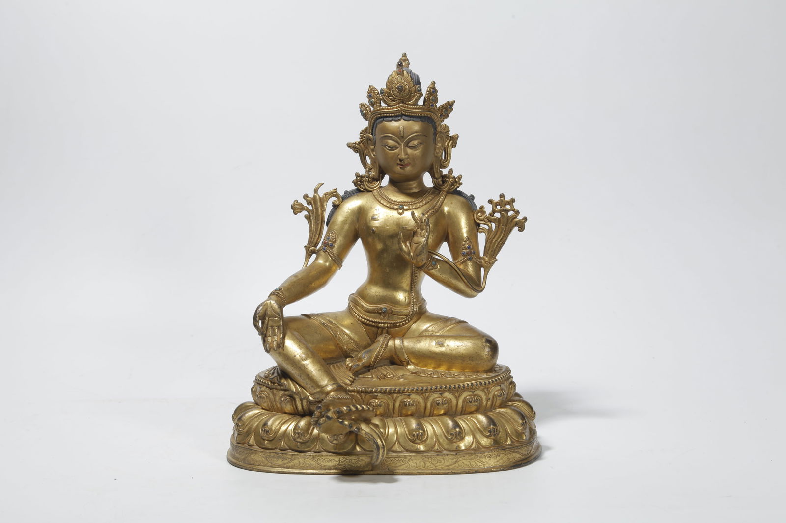 A GILT BRONZE GREEN TARA STATUE (1 of 9)