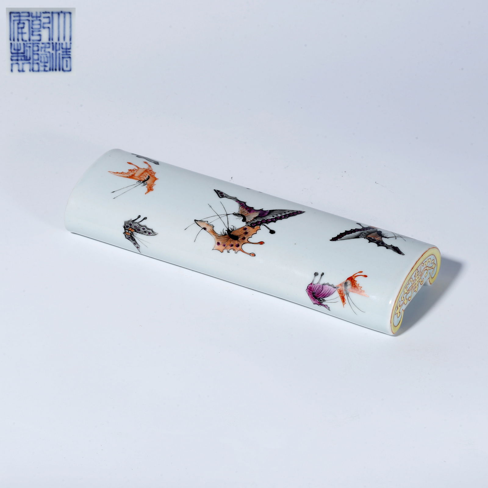 A FAMILLE ROSE BUTTERFLY PATTERN ARMREST: Famille Rose Butterfly Pattern Armrest