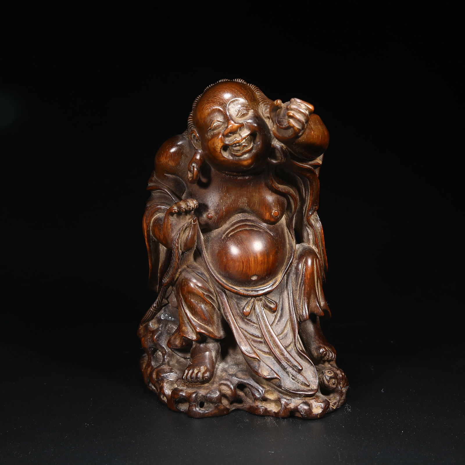 A HUANGHUALI FIGURE OF LIU HAI PLAYING WITH THE GOLDEN TOAD: Huanghuali figure of Liu Hai playing with the golden toad