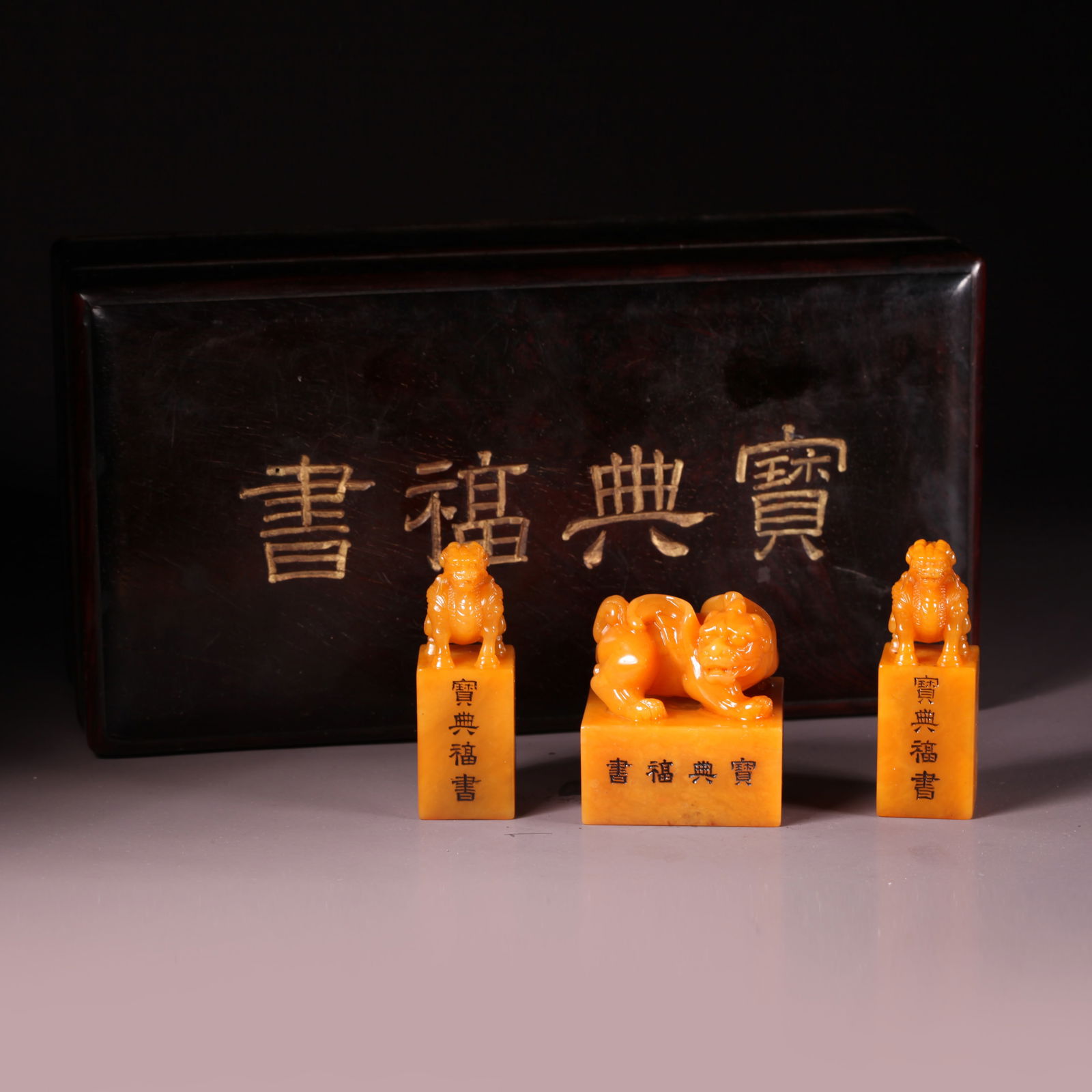 A SHOUSHAN TIANHUANG STONE SEAL WITH QILIN HANDLE (SET): Shoushan Tianhuang Stone Seal with Qilin Handle (Set)