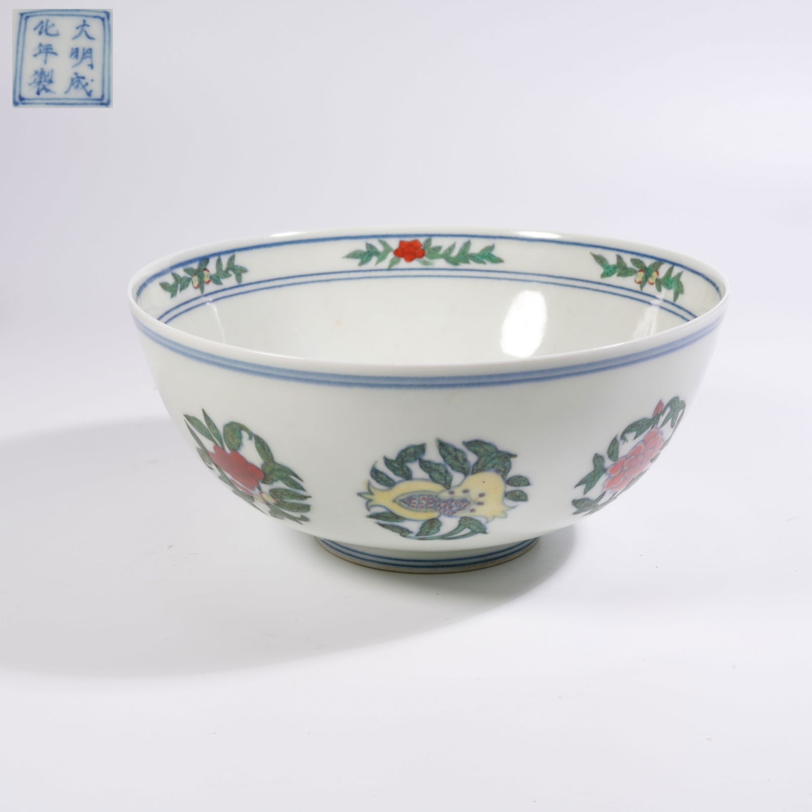 A DOUCAI LARGE BOWL WITH AUSPICIOUS FRUIT MOTIFS (1 of 9)