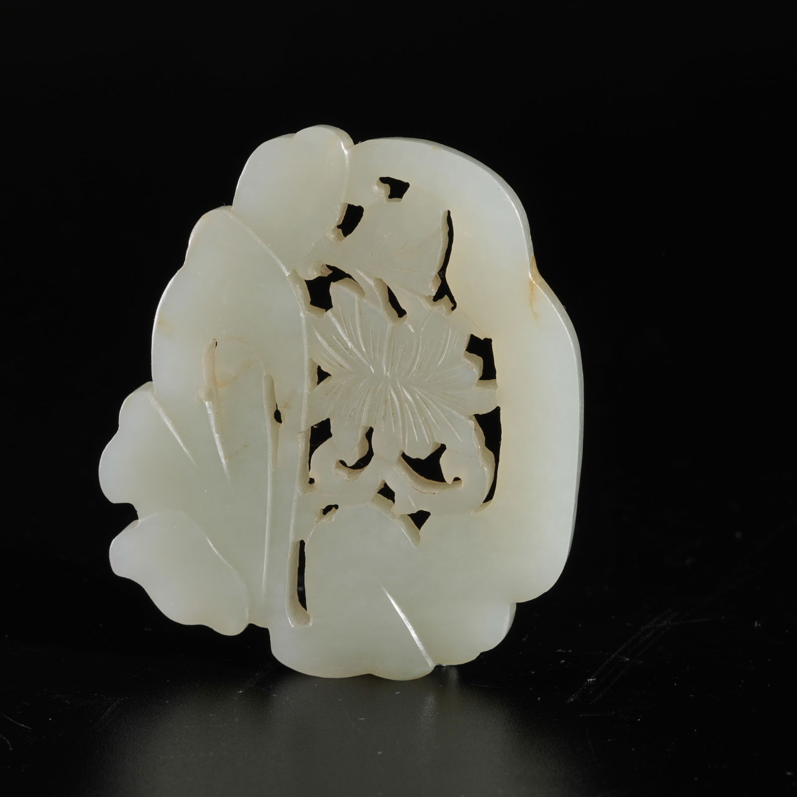 A HETIAN JADE CARVED AUSPICIOUS PENDANT (1 of 10)