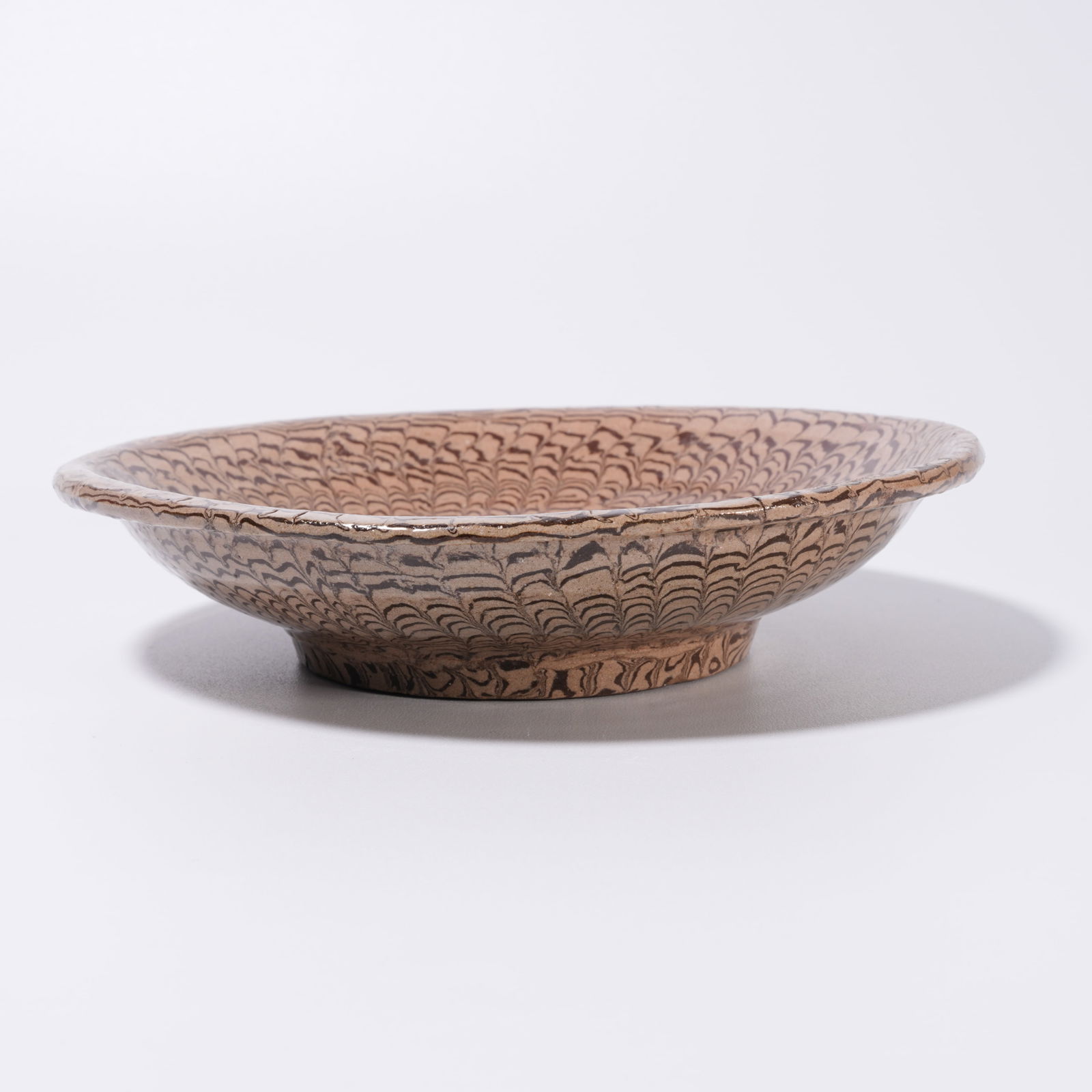 A MARBLED-SLIPWARE DISH - 5