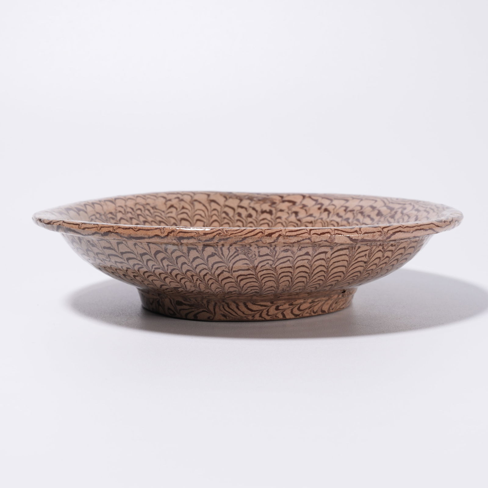 A MARBLED-SLIPWARE DISH - 6