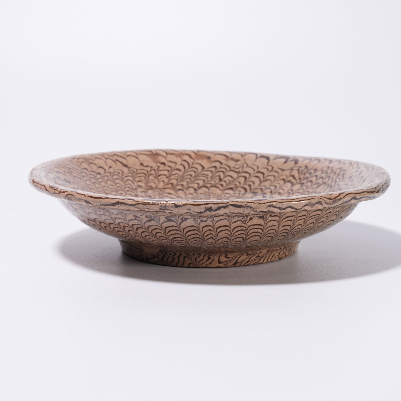 A MARBLED-SLIPWARE DISH - 7