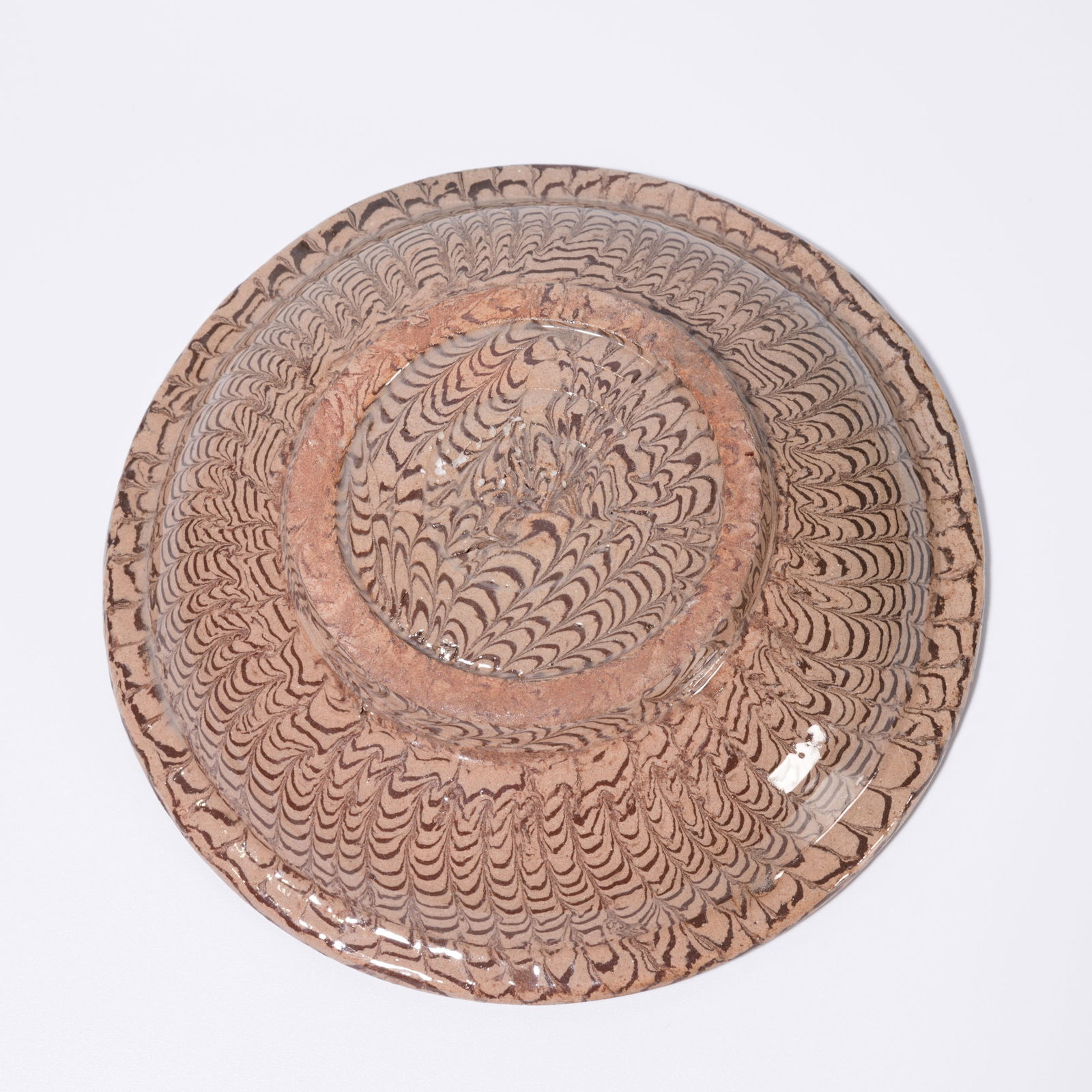 A MARBLED-SLIPWARE DISH - 9
