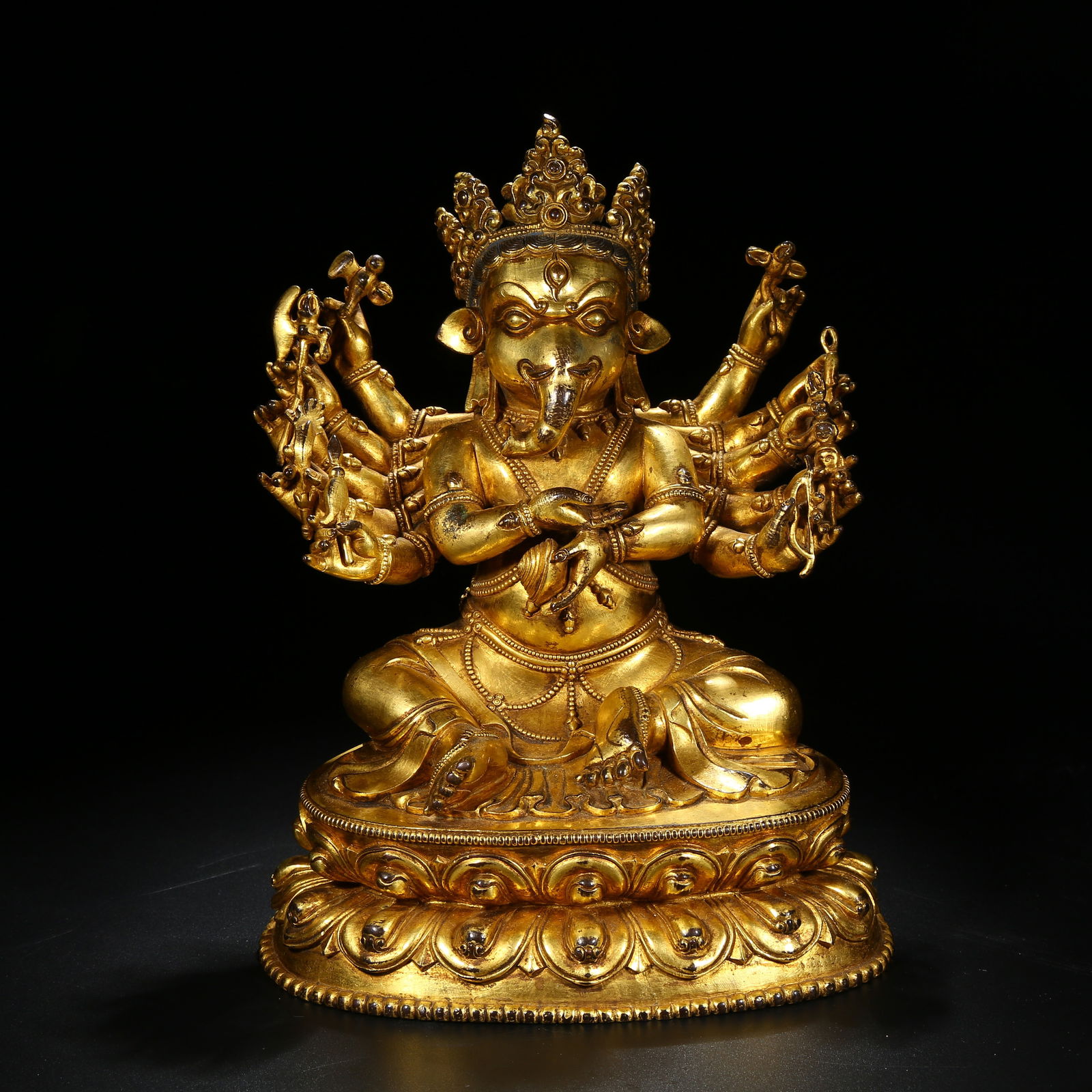 A GILT BRONZE VINAYAKA (GANAPATI) STATUE: Gilt bronze Vinayaka (Ganapati) statue
