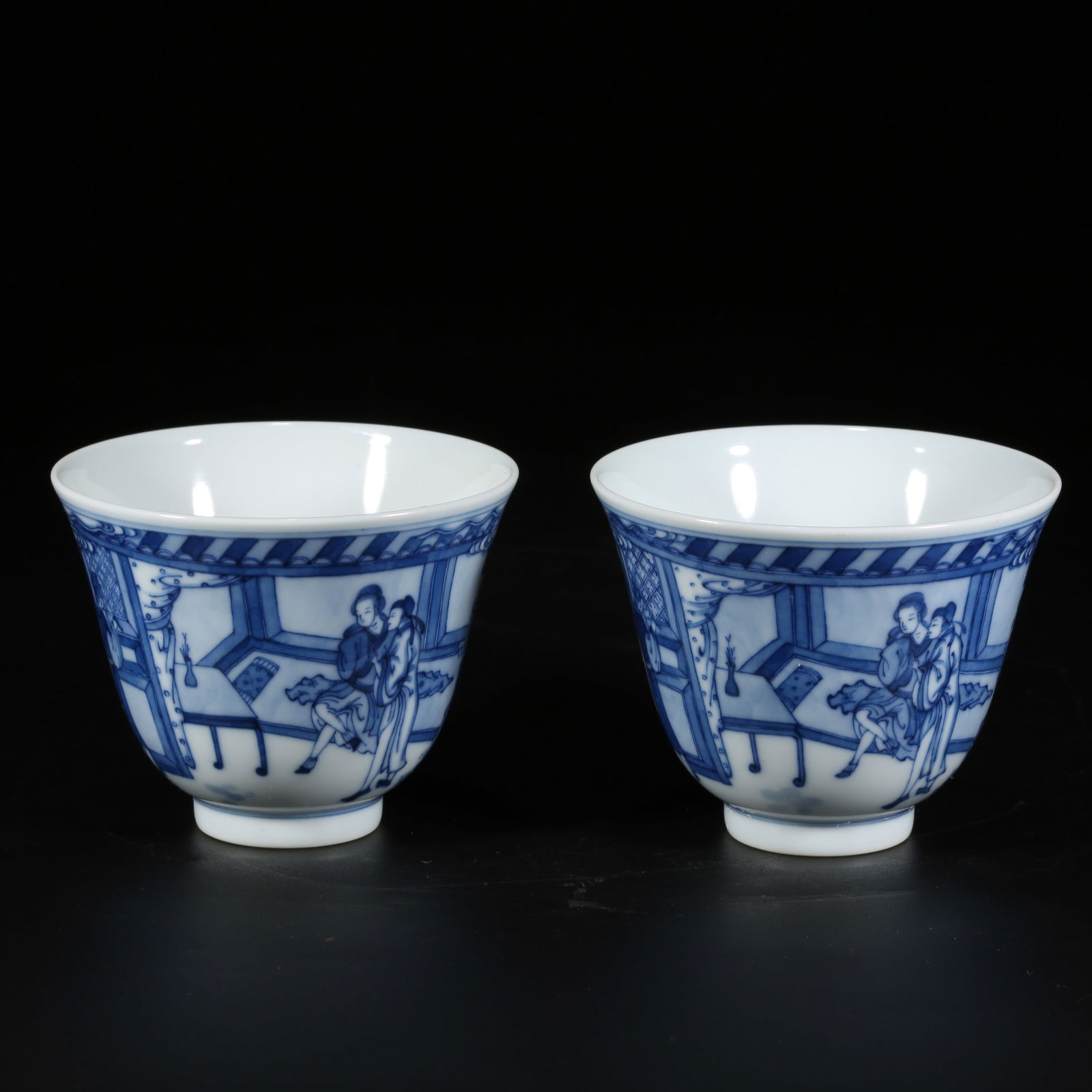 A SET OF BLUE-AND-WHITE CUPS WITH FIGURES AND STORY SCENES (1 of 9)