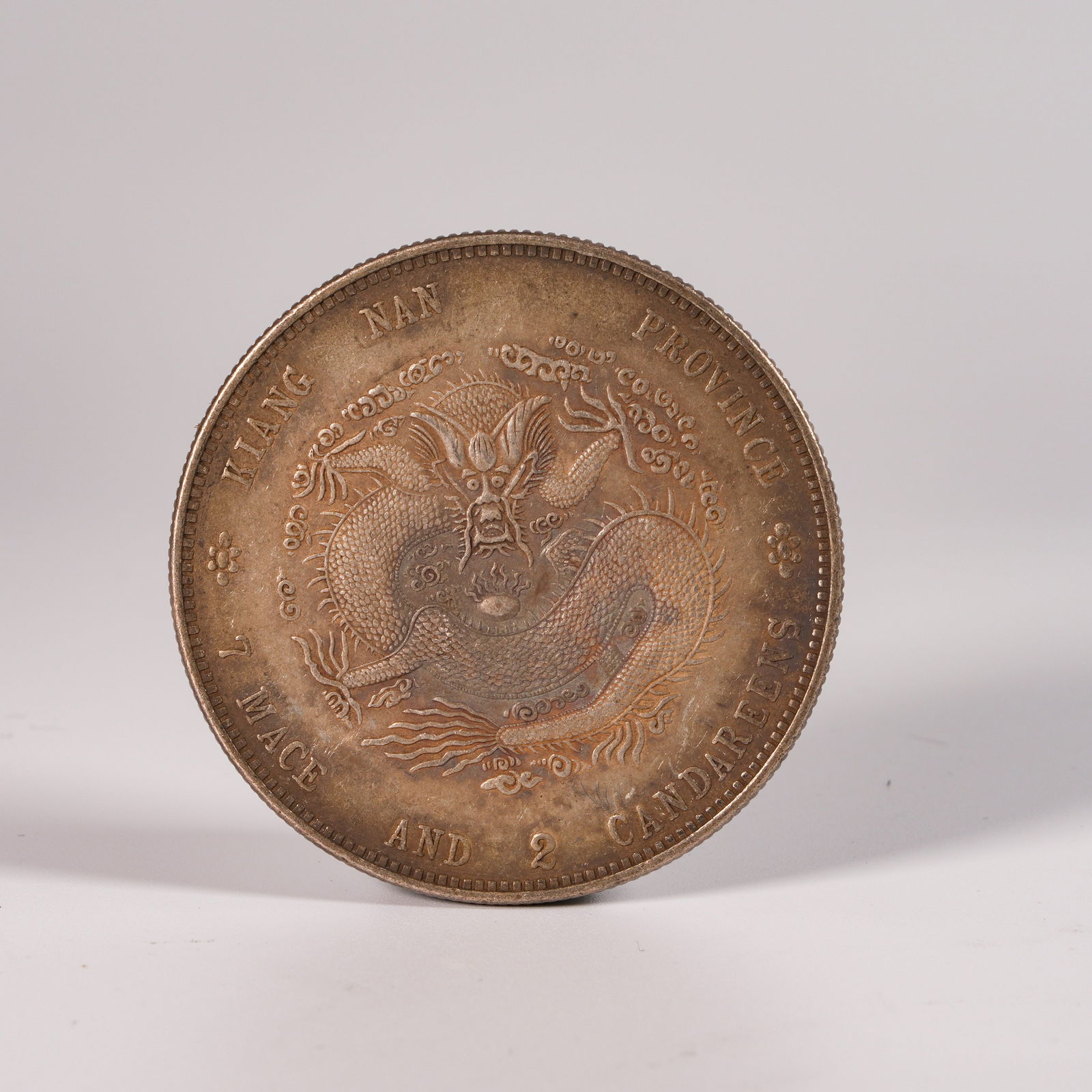 A SILVER DOLLAR COIN - 3