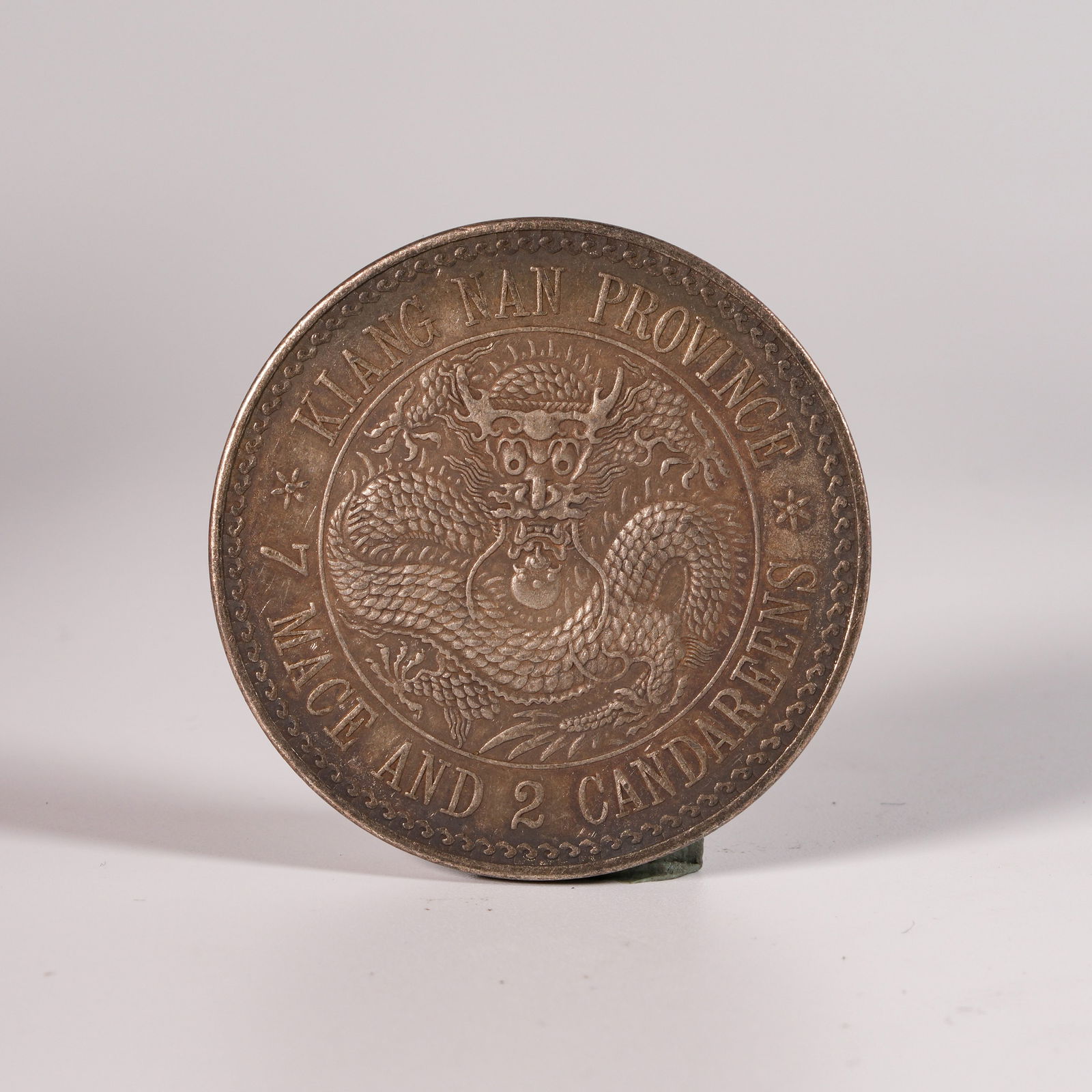 A SILVER DOLLAR COIN - 3