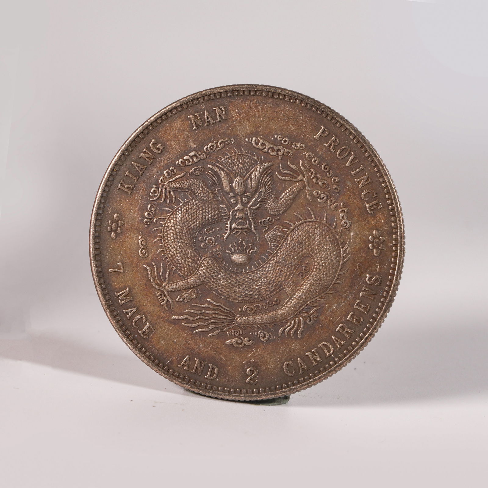 A SILVER DOLLAR COIN - 3