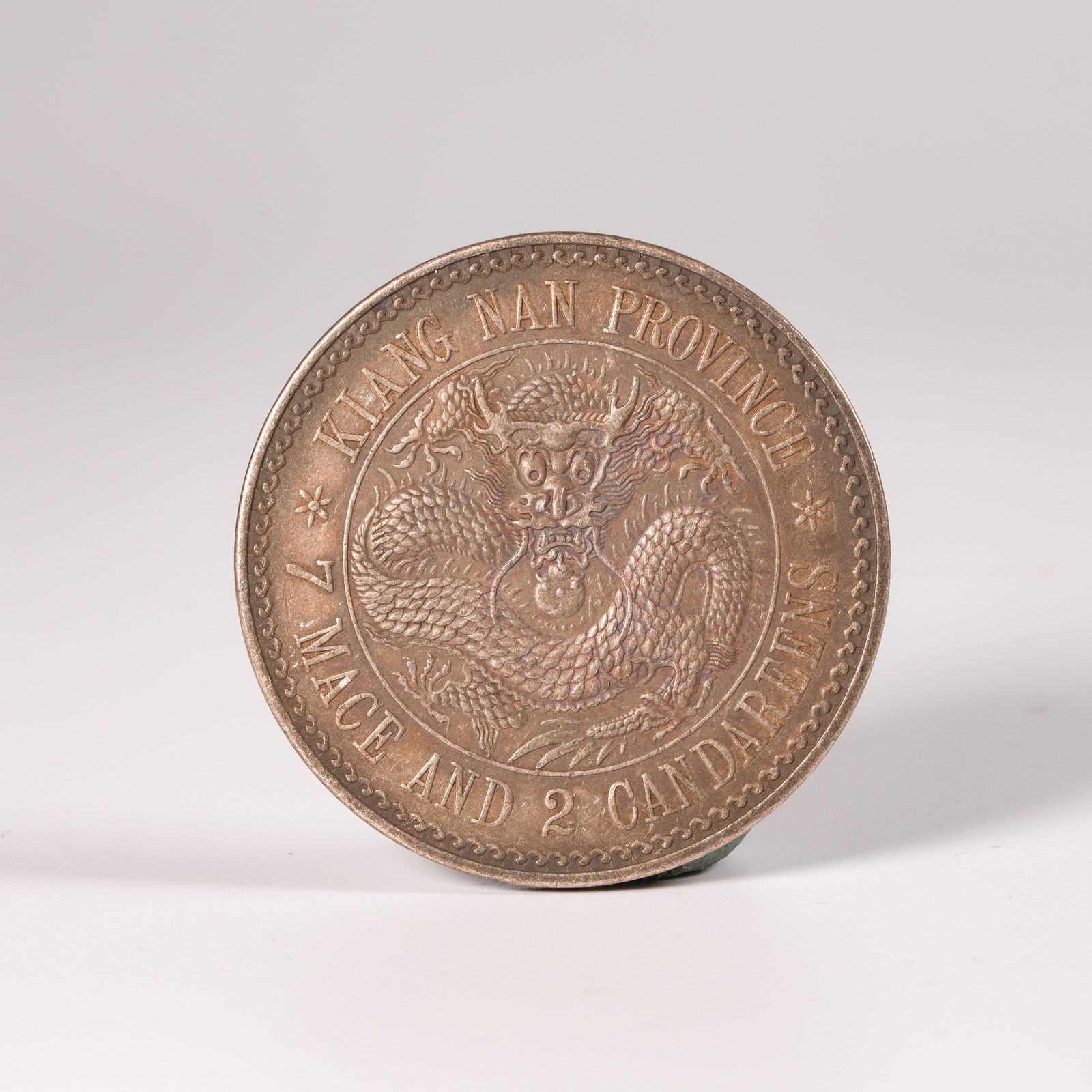 A SILVER DOLLAR COIN - 3