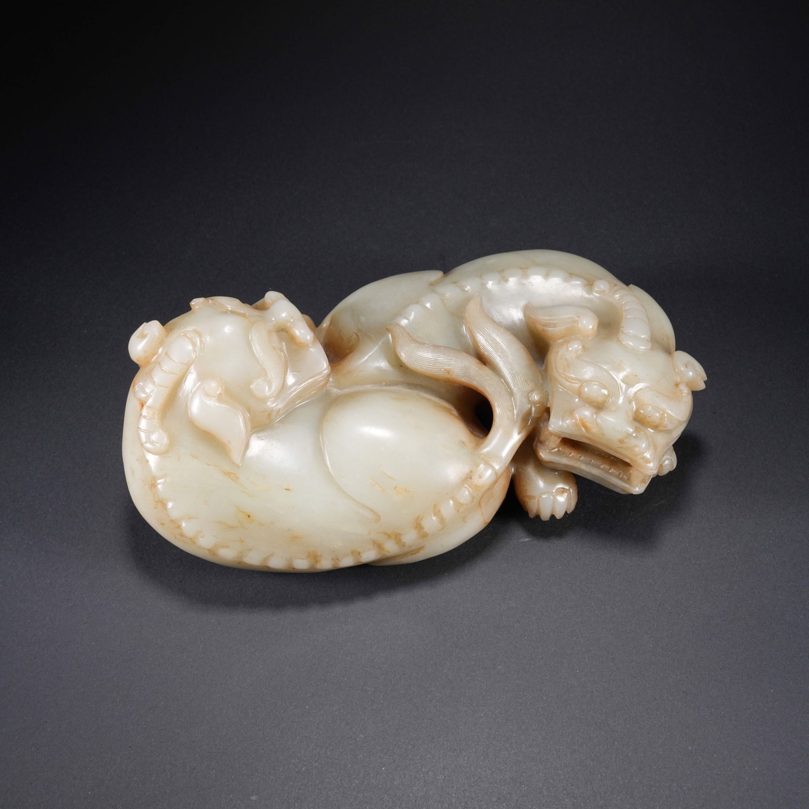 A HETIAN JADE CARVED LARGE AND SMALL LION FIGURES: Hetian Jade Carved Large and Small Lion Figures