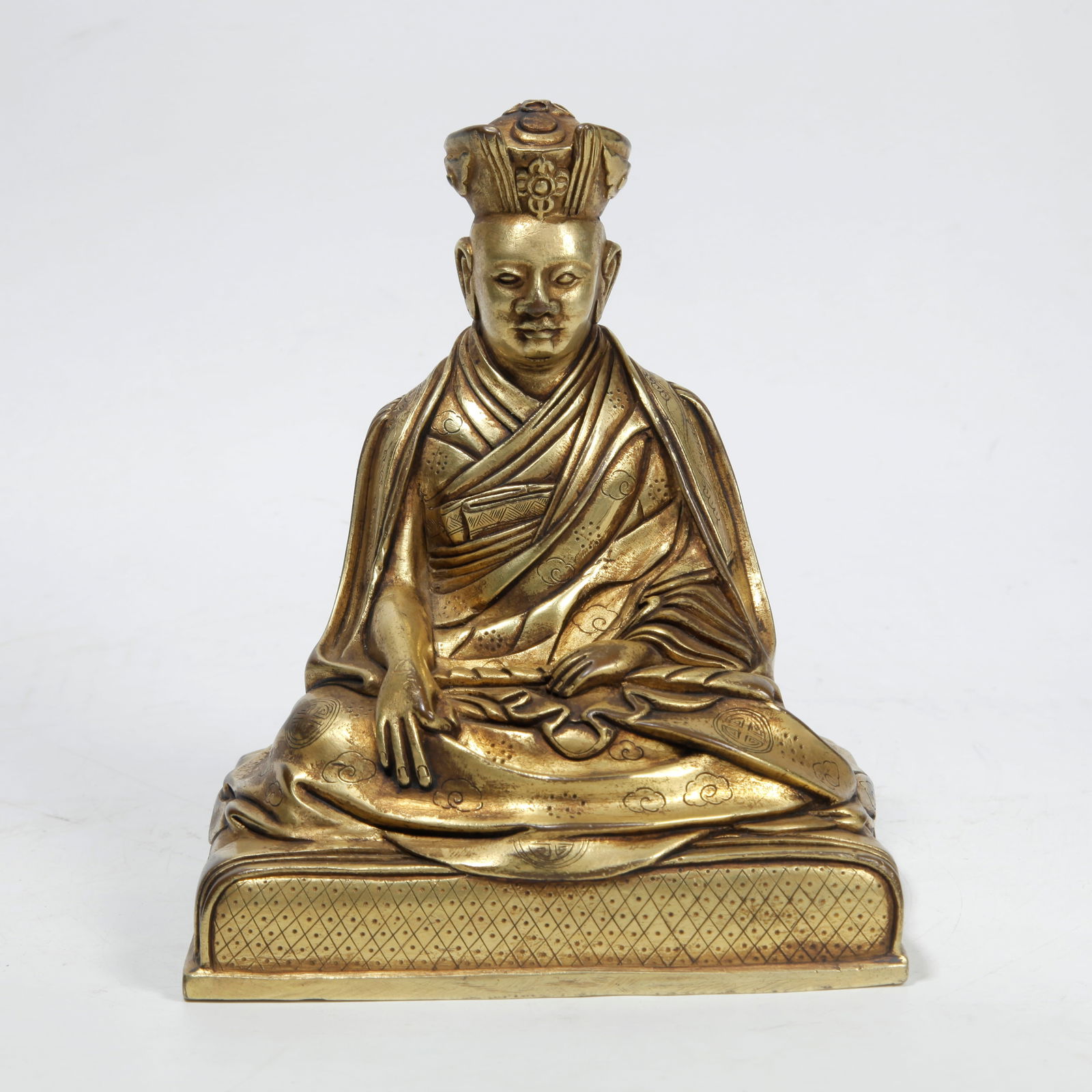 A GILT BRONZE LAMA STATUE: Gilt Bronze Lama Statue