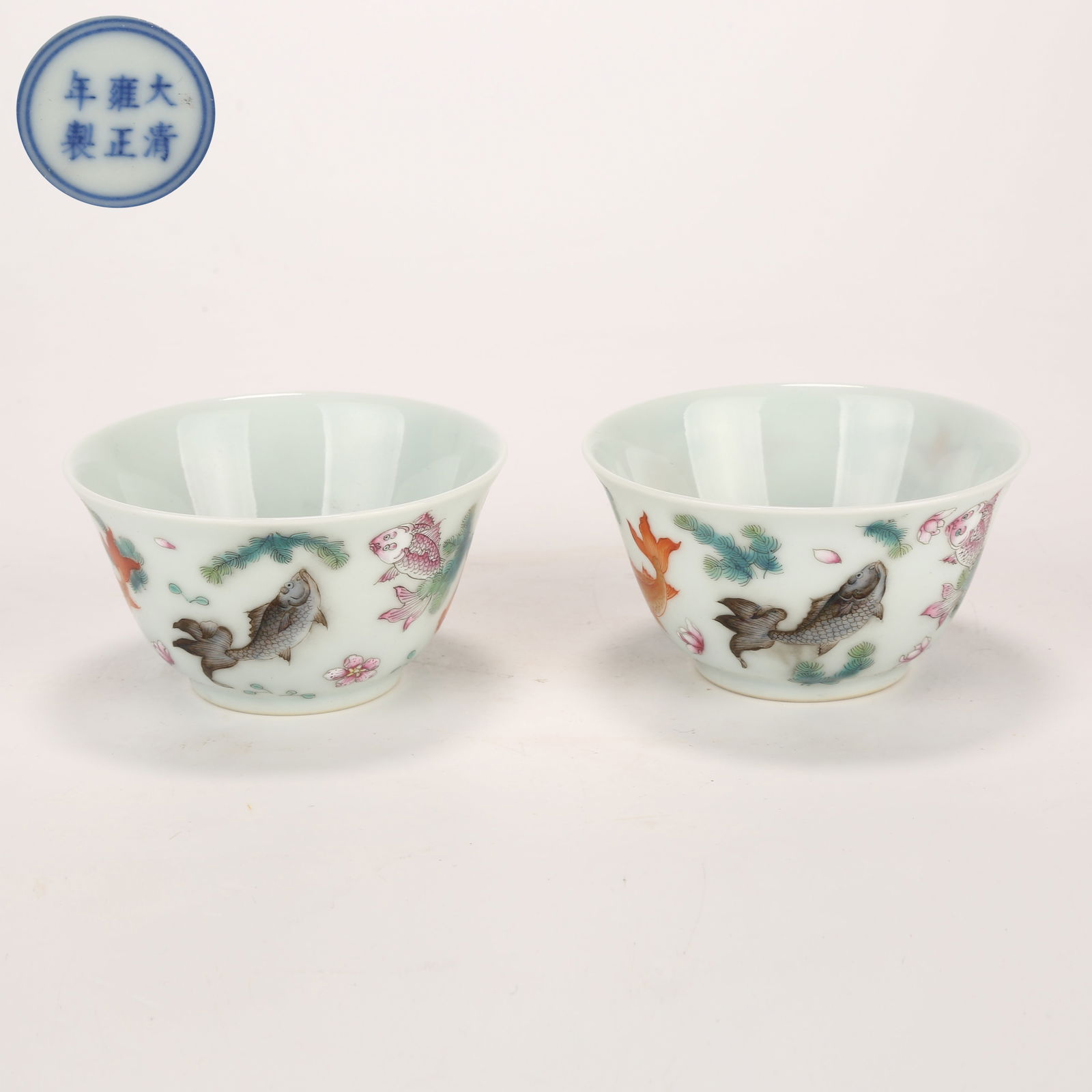 A SET OF FAMILLE-ROSE CUPS WITH FISH AND AQUATIC PLANTS MOTIF: Set of famille-rose cups with fish and aquatic plants motif