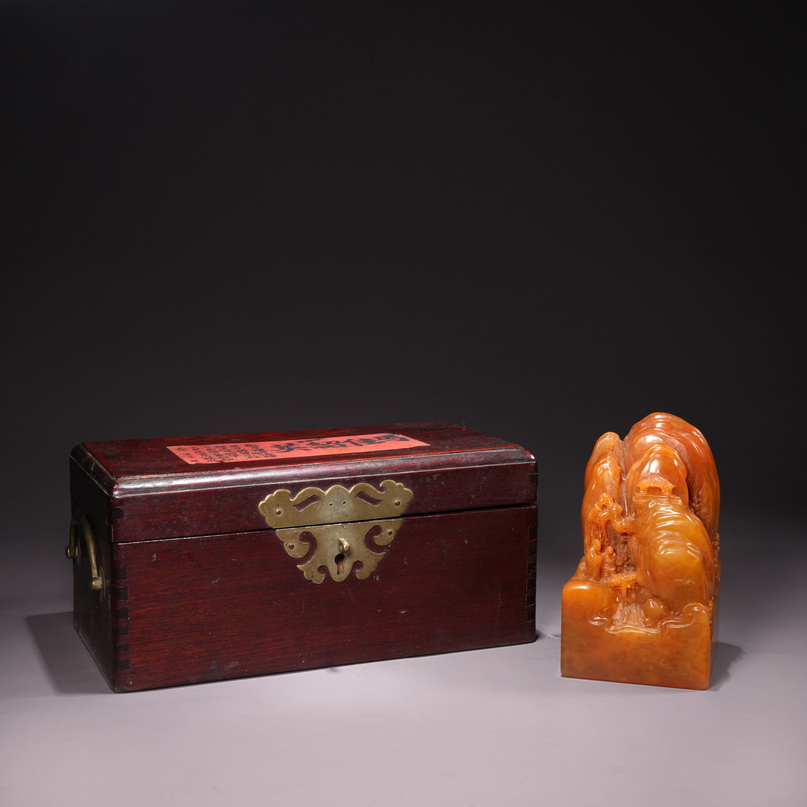 A SHOUSHAN TIANHUANG STONE SEAL WITH FIGURE AND LANDSCAPE (SHANZI) MOTIF: Shoushan Tianhuang Stone Seal with Figure and Landscape (Shanzi) Motif
