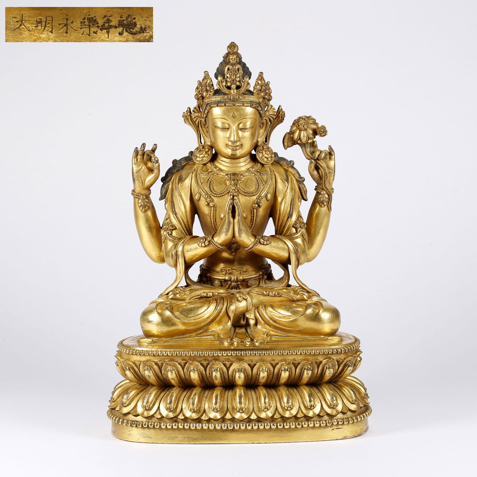 A GILT BRONZE FOUR-ARMED AVALOKITESHVARA STATUE: Gilt Bronze Four-Armed Avalokiteshvara Statue