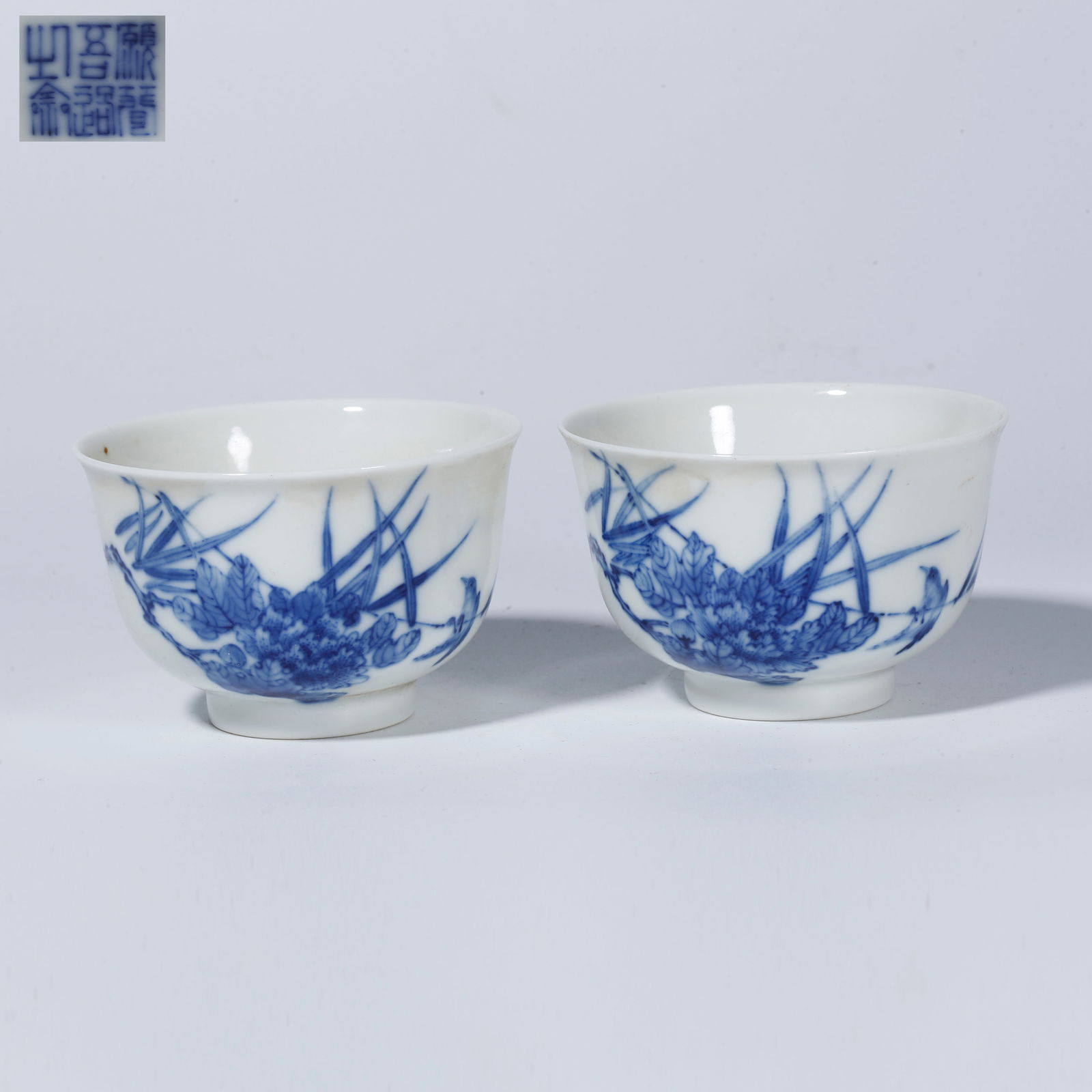 A BLUE-AND-WHITE FLOWER-AND-BIRD CUP (PAIR) (1 of 10)