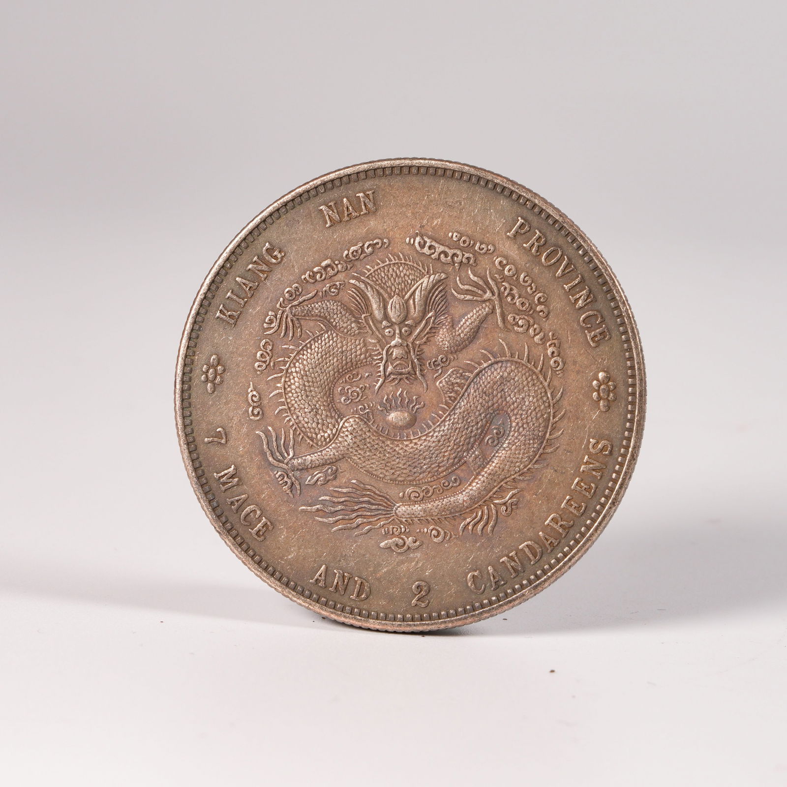 A SILVER DOLLAR COIN - 3