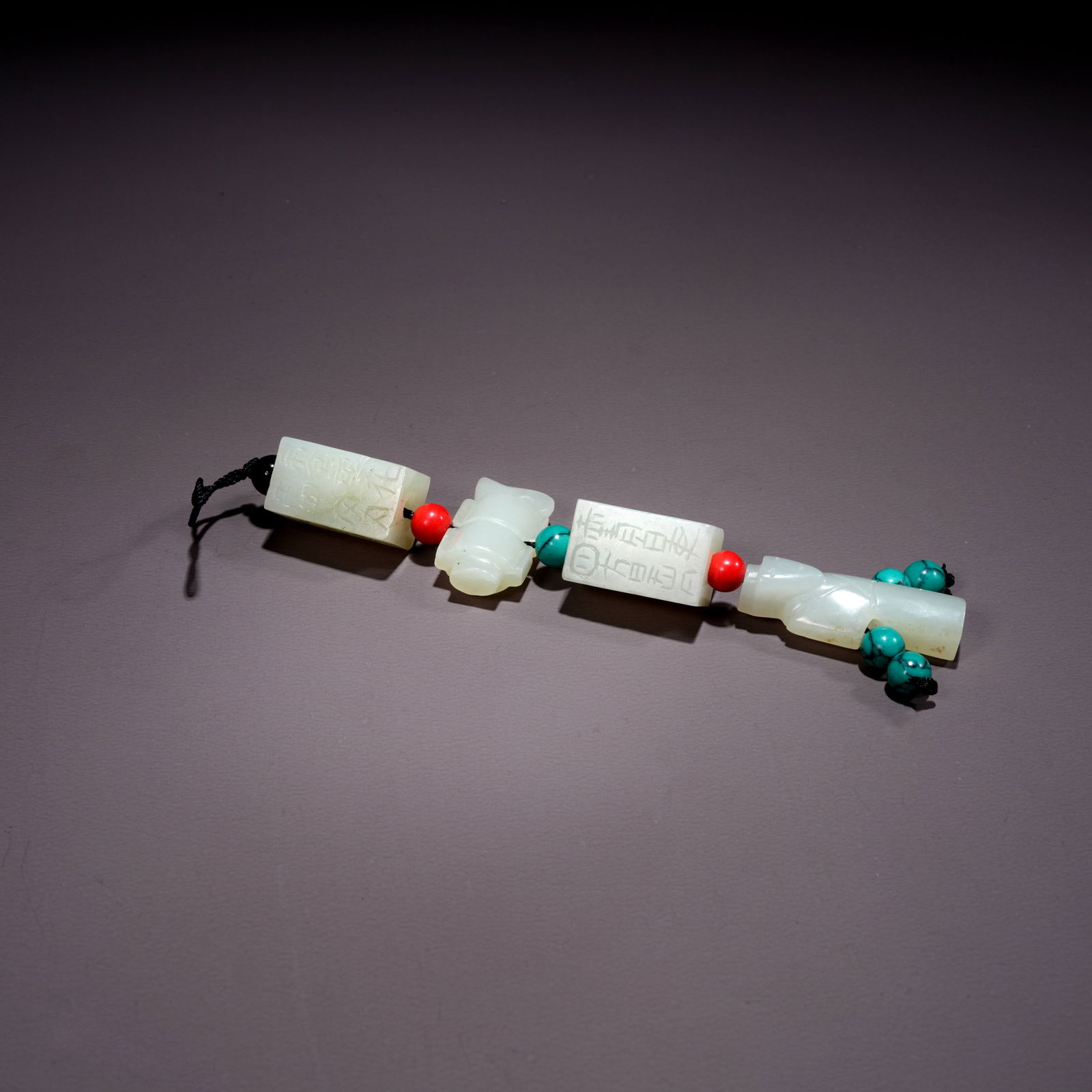 A HETIAN WHITE JADE PENDANT WITH PIXIU MOTIF: Hetian White Jade Pendant with Pixiu Motif