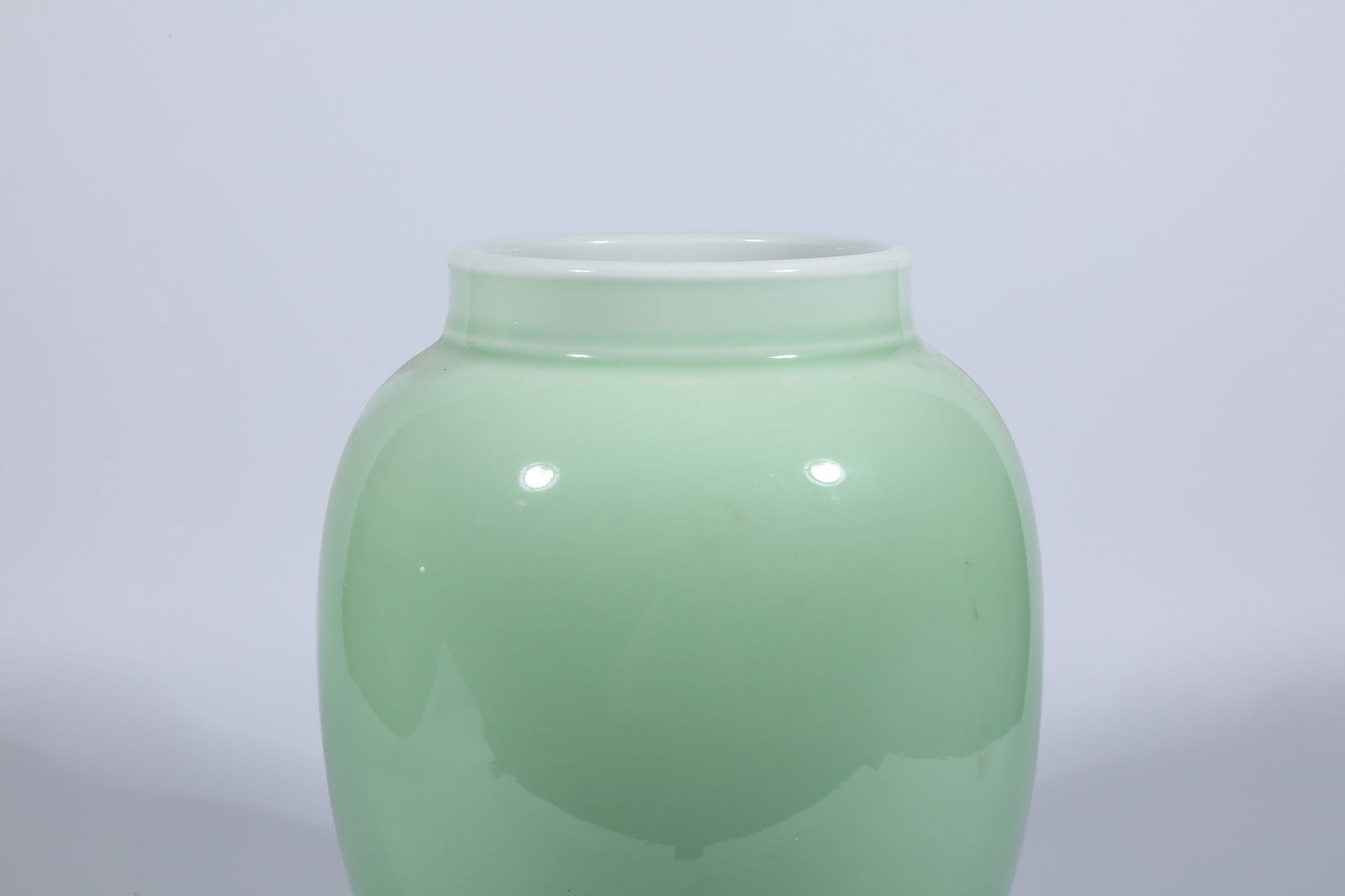 A CELADON-GLAZED JAR - 4