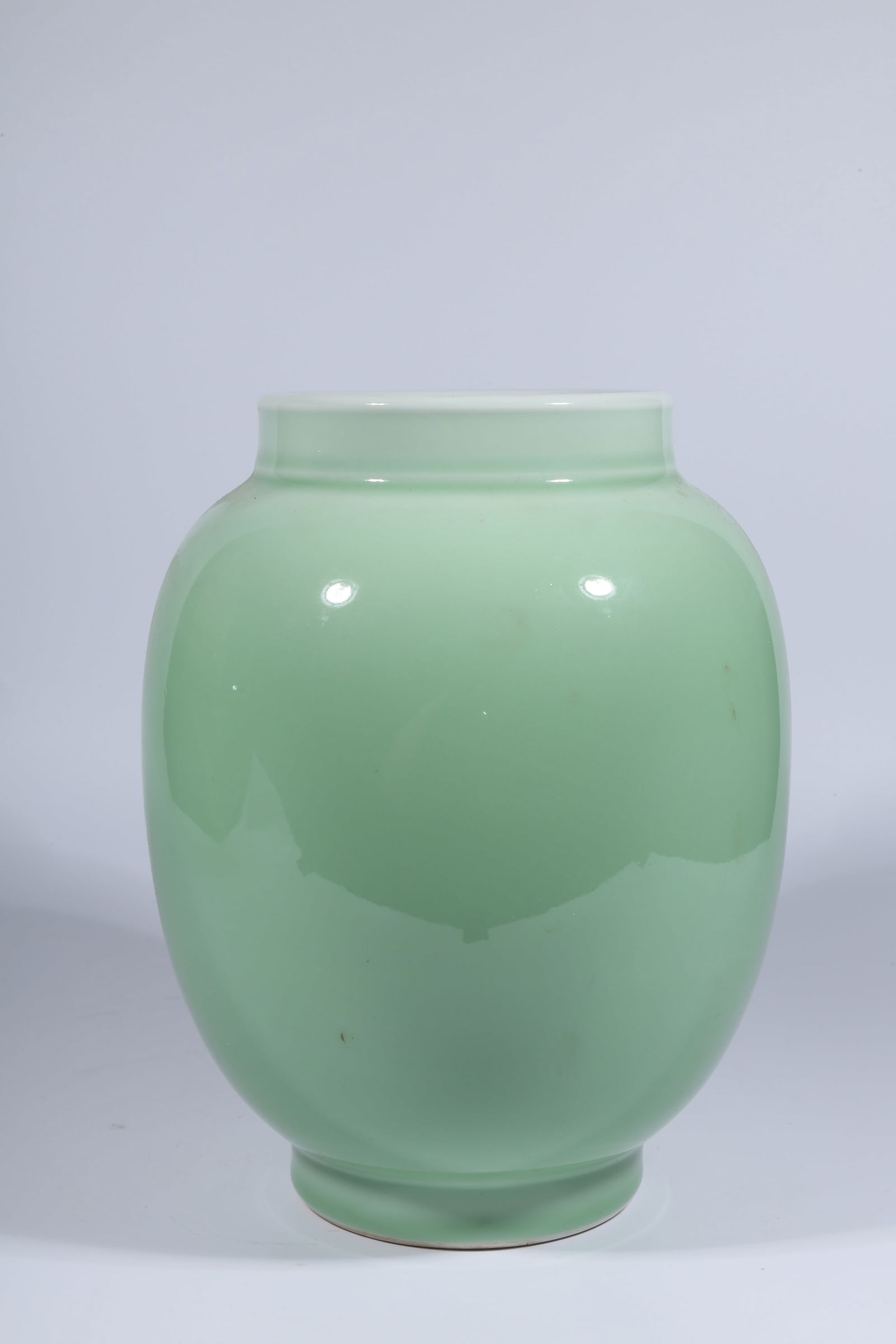 A CELADON-GLAZED JAR - 5