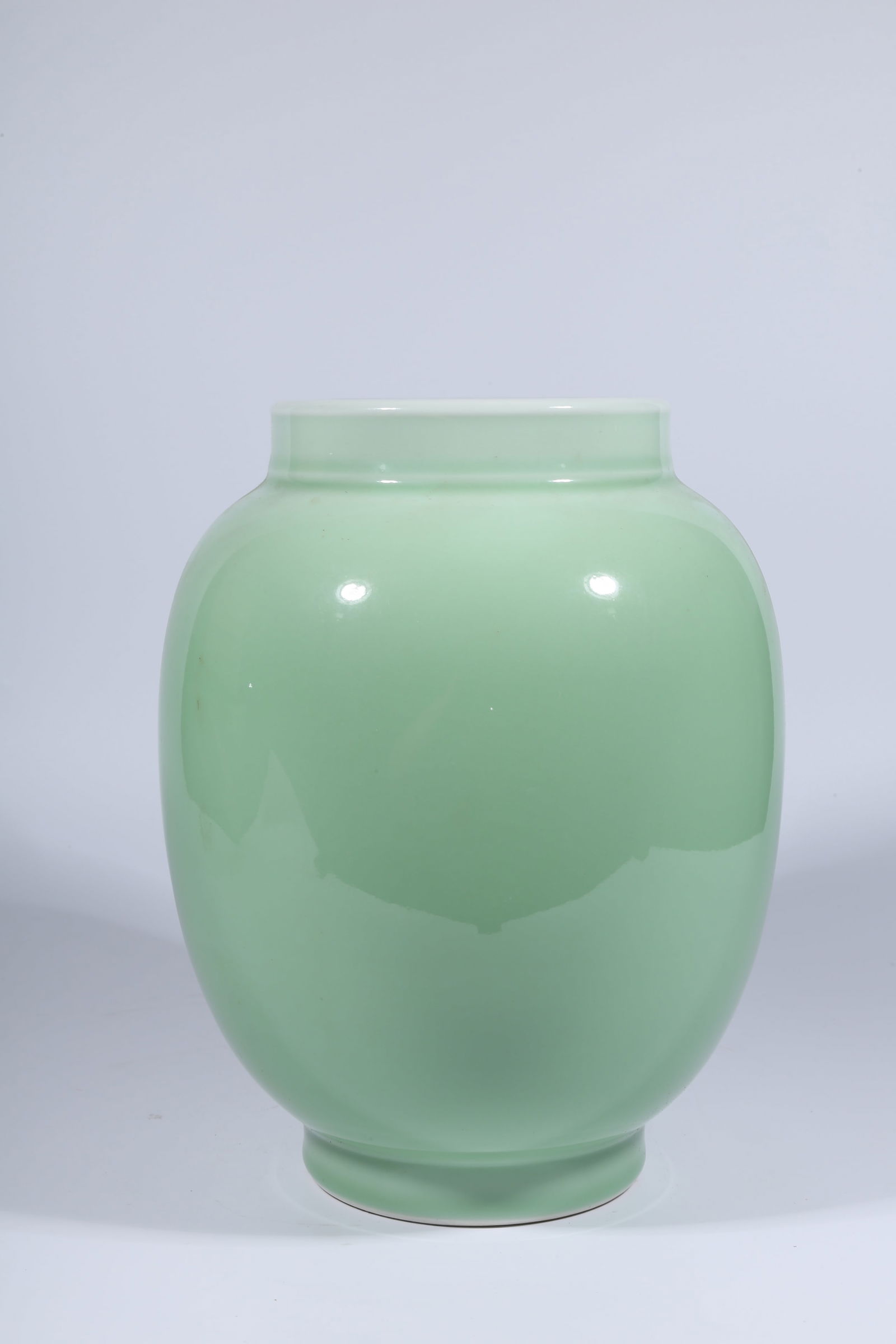 A CELADON-GLAZED JAR - 6
