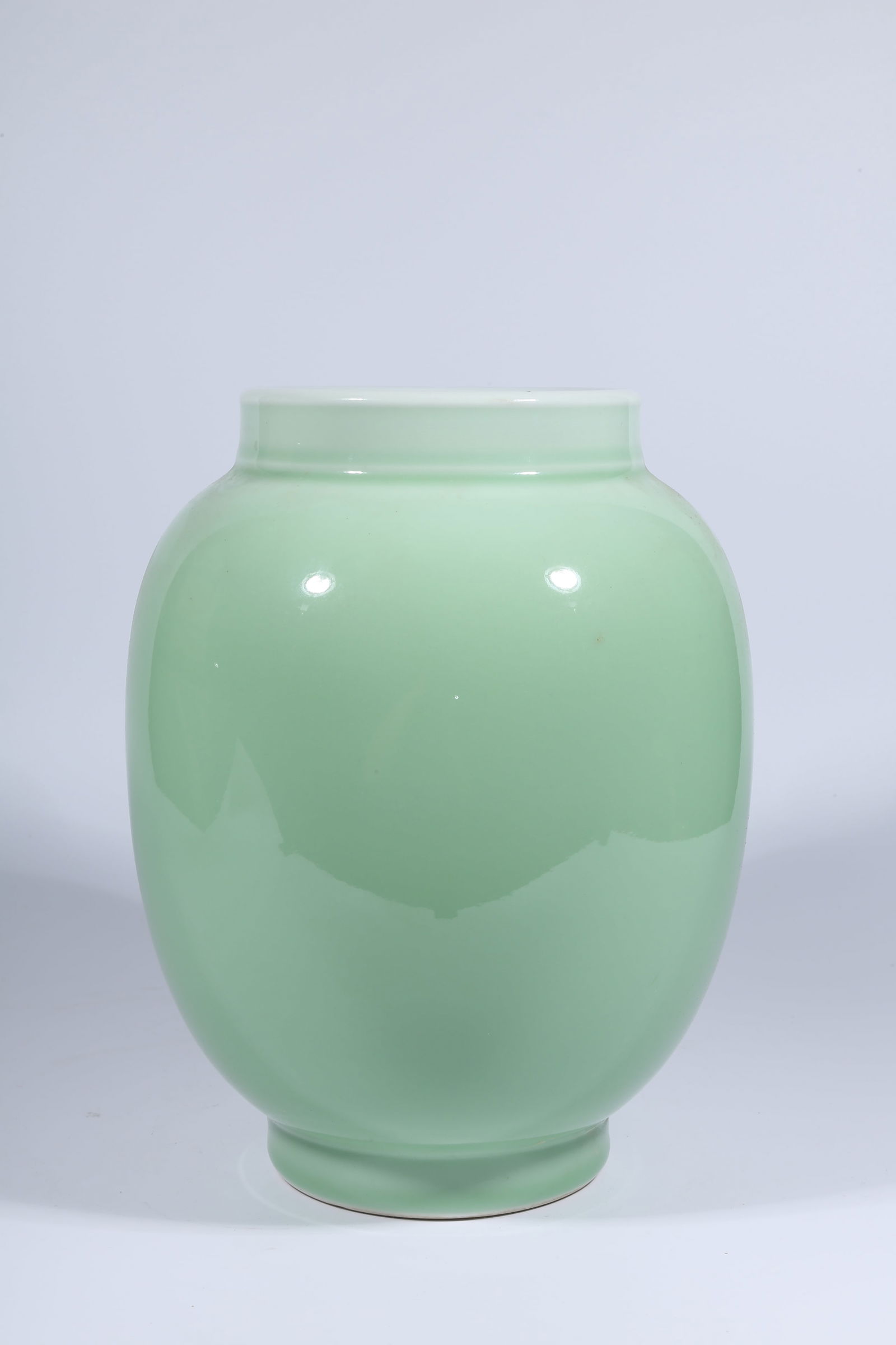 A CELADON-GLAZED JAR - 7
