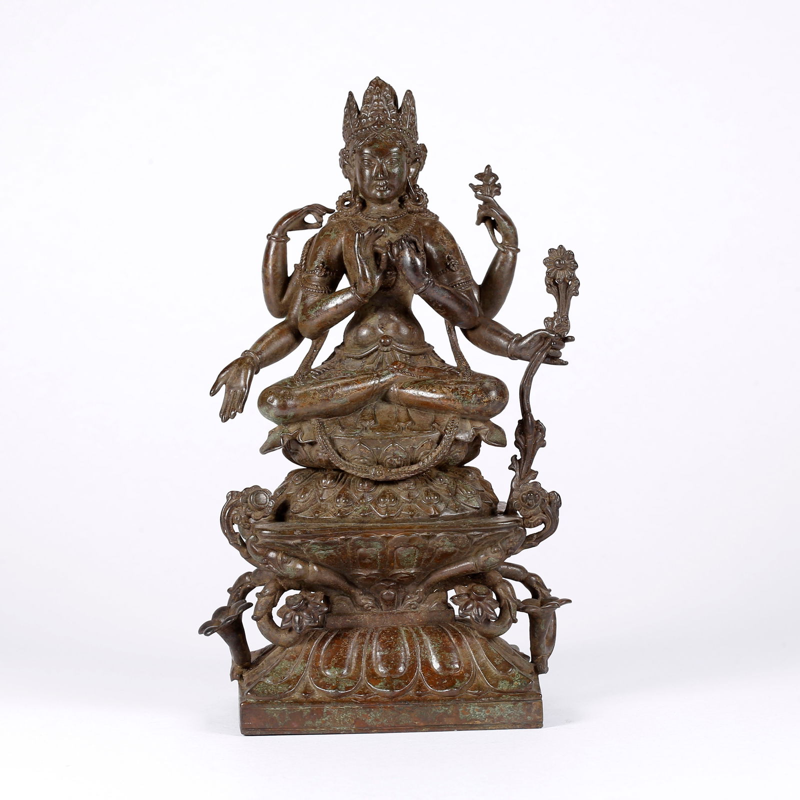 A BRONZE BODHISATTVA ON LOTUS HAND: Bronze Bodhisattva on Lotus Hand