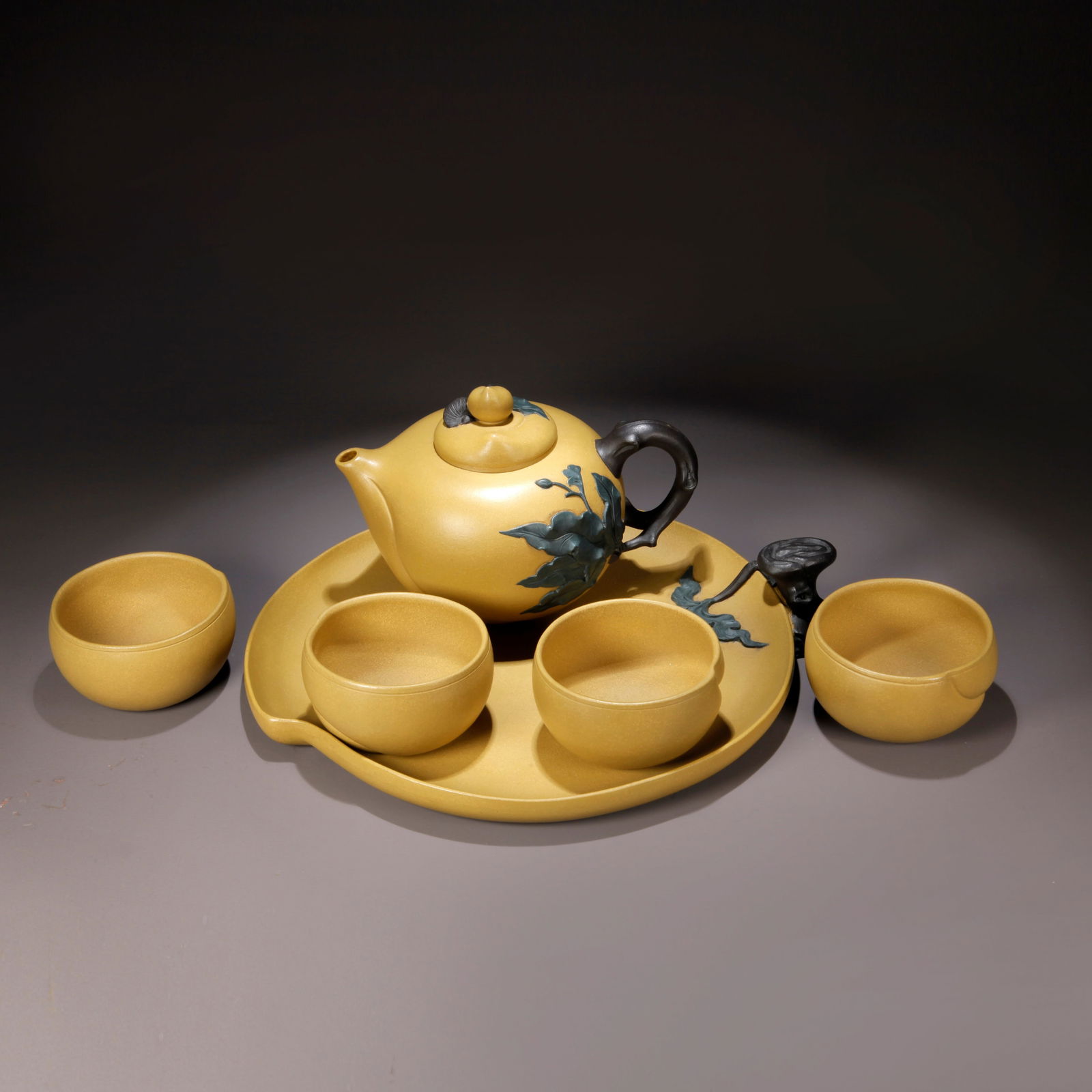 A ZISHA CLAY EWER WITH CARVED LONGEVITY PEACH KNOB: Zisha Clay Ewer with Carved Longevity Peach Knob