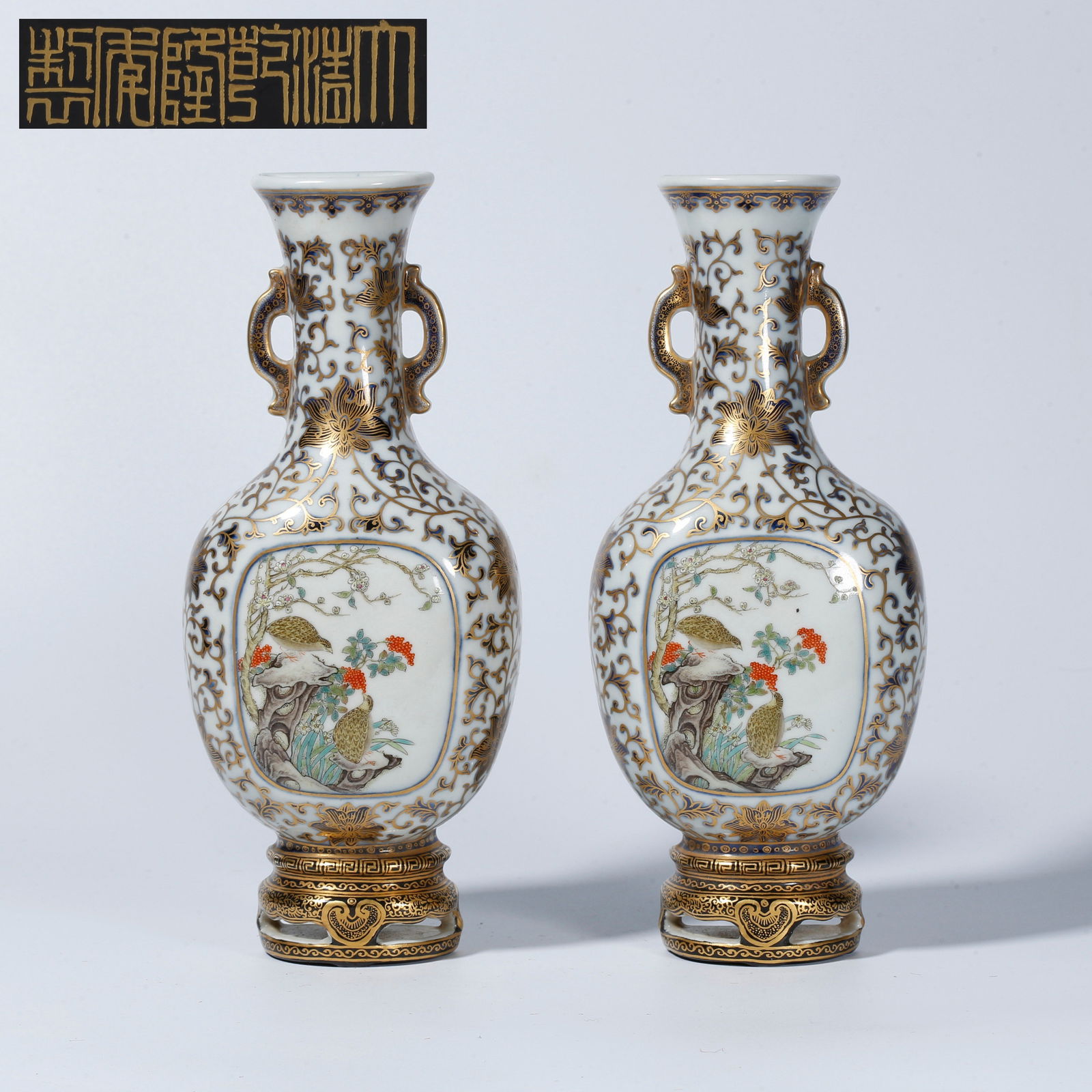 A FAMILLE ROSE WALL VASE WITH FLOWER-AND-BIRD DESIGN (PAIR): Famille Rose Wall Vase with Flower-and-Bird Design (Pair)